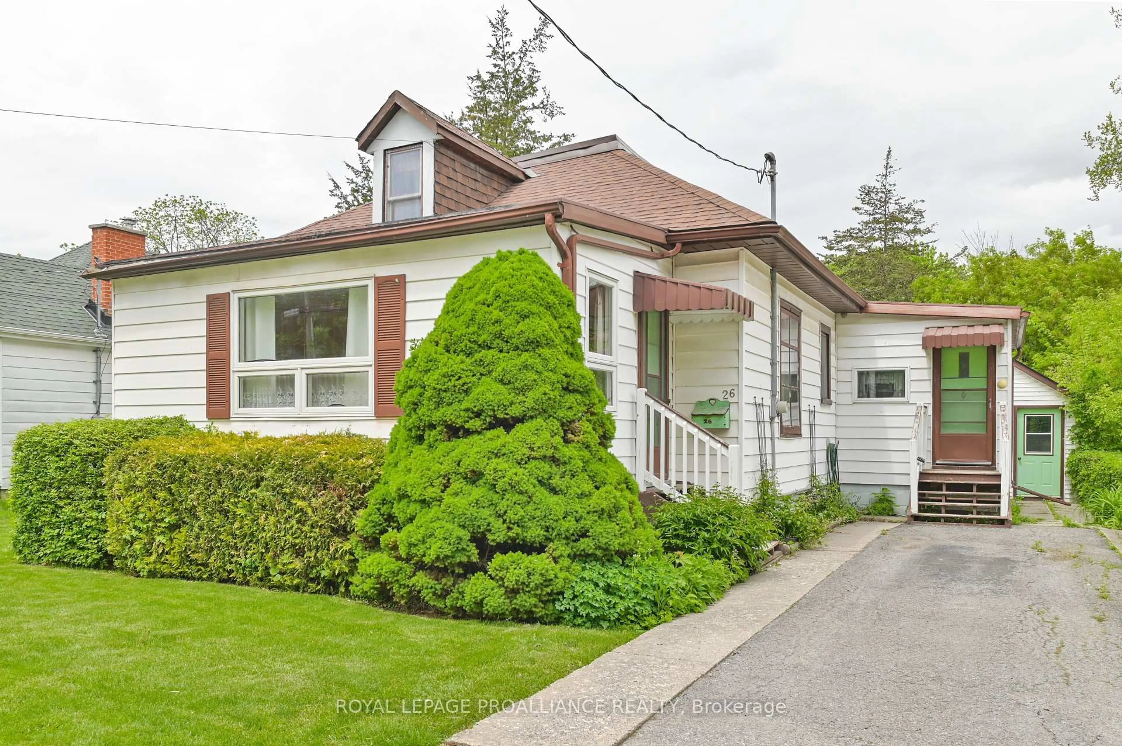 Home with vinyl exterior material, street for 26 Charlotte St, Belleville Ontario K8P 1E2
