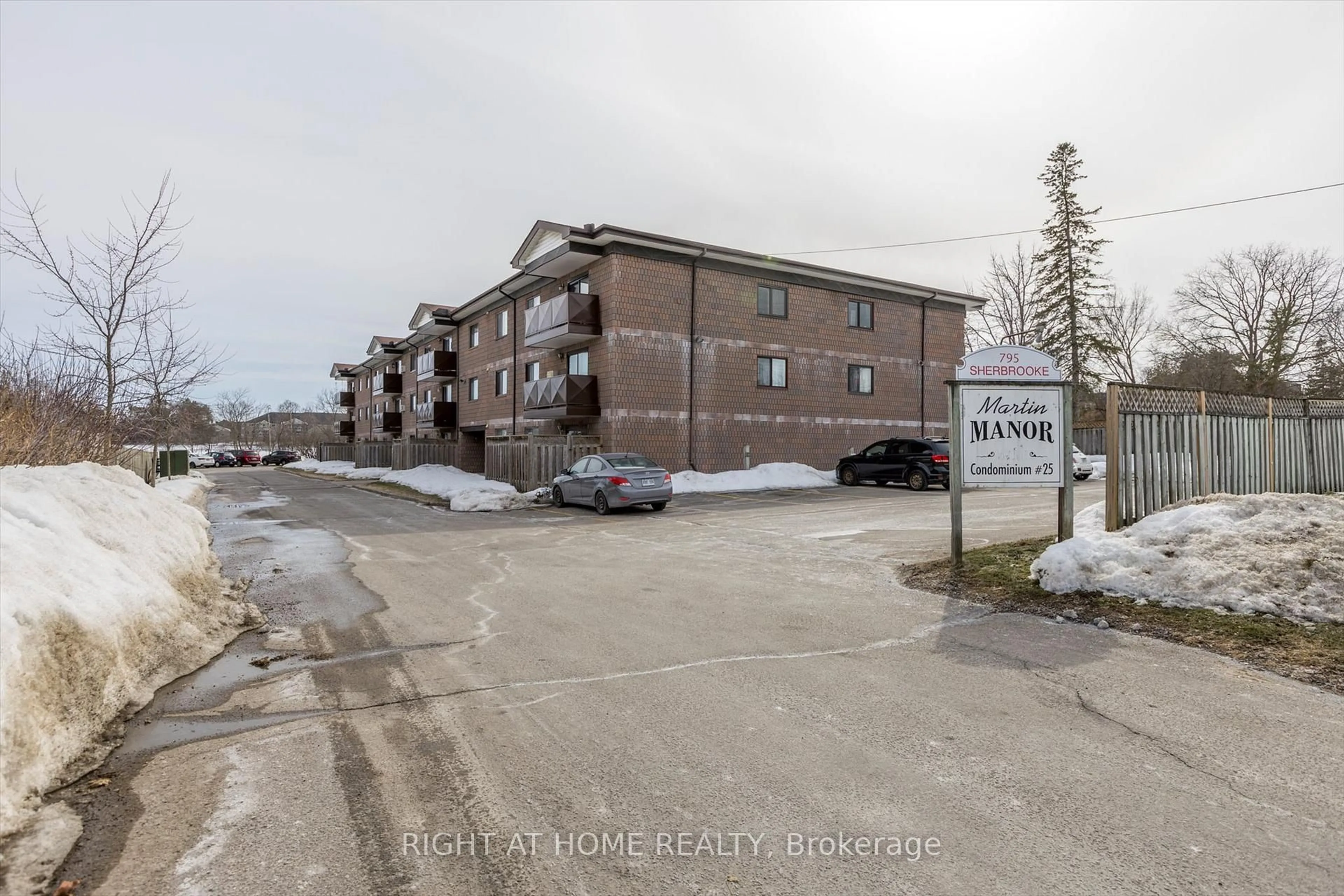 A pic from outside/outdoor area/front of a property/back of a property/a pic from drone, street for 795 Sherbrooke St #208, Peterborough West Ontario K9J 2R2