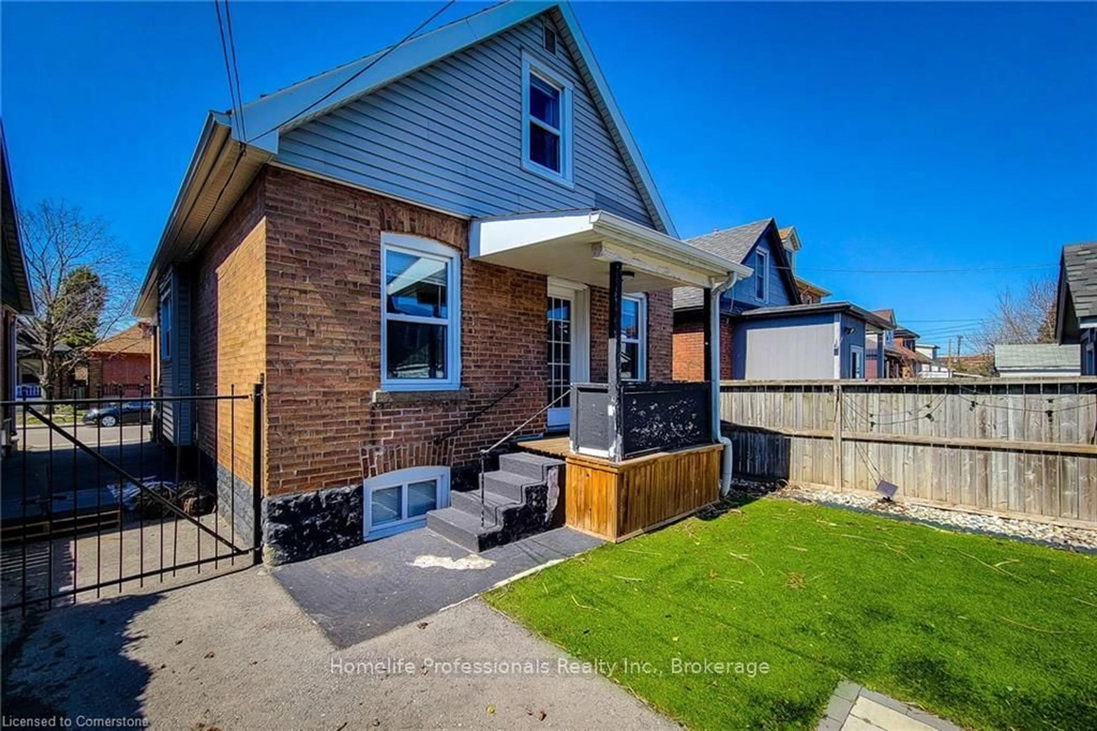 Home with brick exterior material, street for 20 Connaught Ave, Hamilton Ontario L8L 6Y7