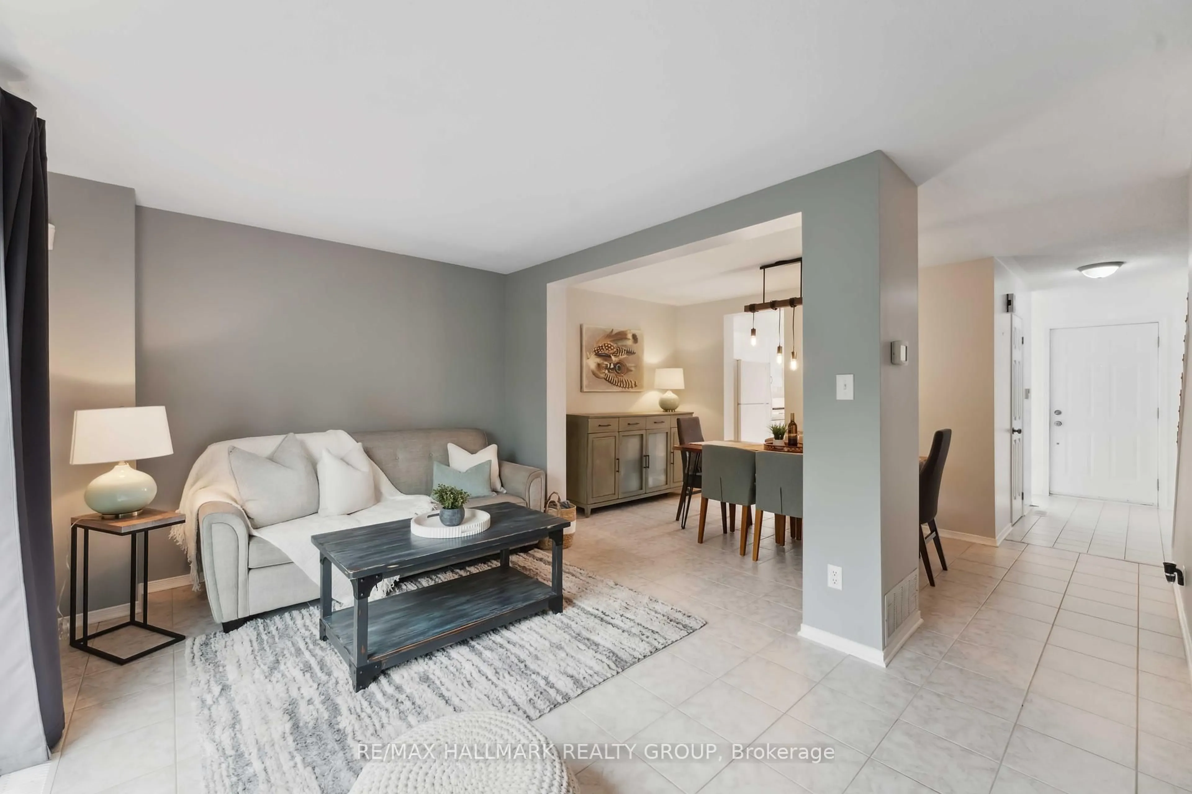 Living room with furniture, ceramic/tile floor for 1853 Loranger Crt, Orleans Ontario K1C 7H6