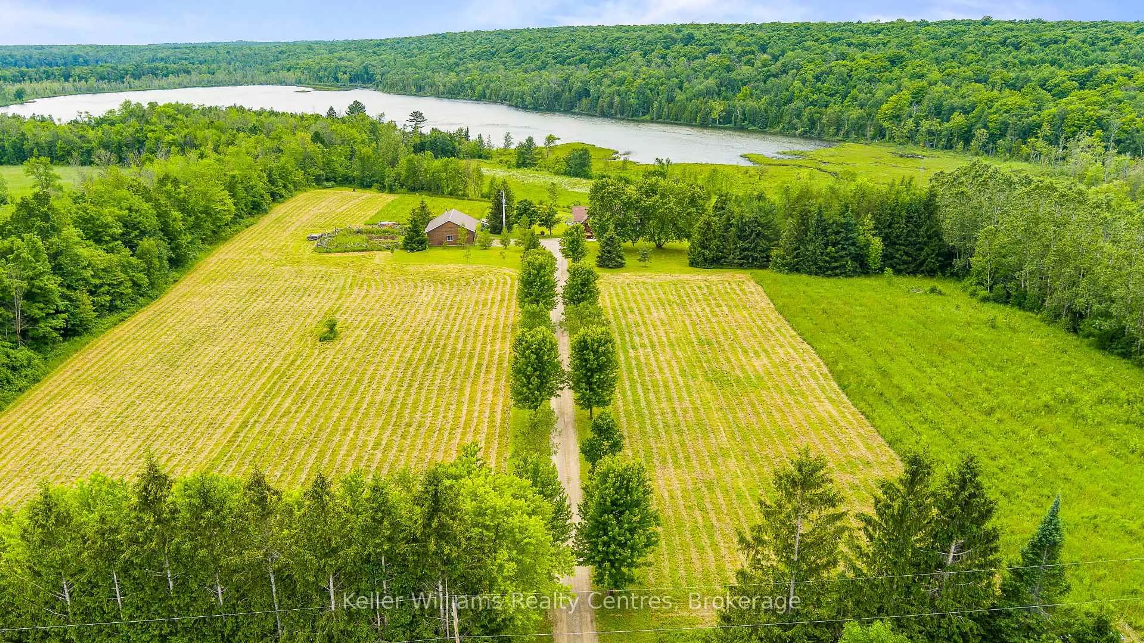 A pic from outside/outdoor area/front of a property/back of a property/a pic from drone, water/lake/river/ocean view for 210182 Burgess Side Rd, Georgian Bluffs Ontario N0H 1S0