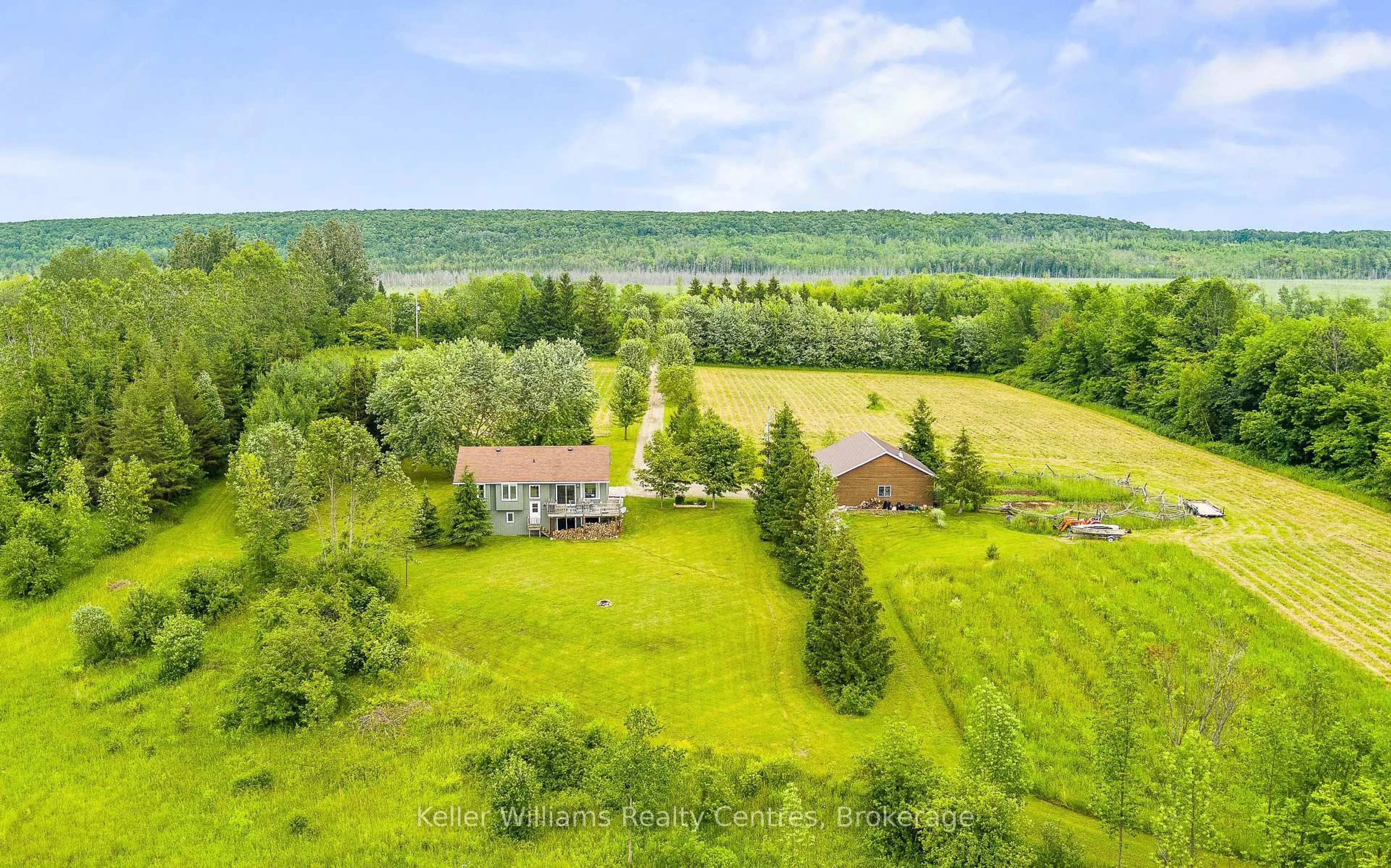 A pic from outside/outdoor area/front of a property/back of a property/a pic from drone, water/lake/river/ocean view for 210182 Burgess Side Rd, Georgian Bluffs Ontario N0H 1S0