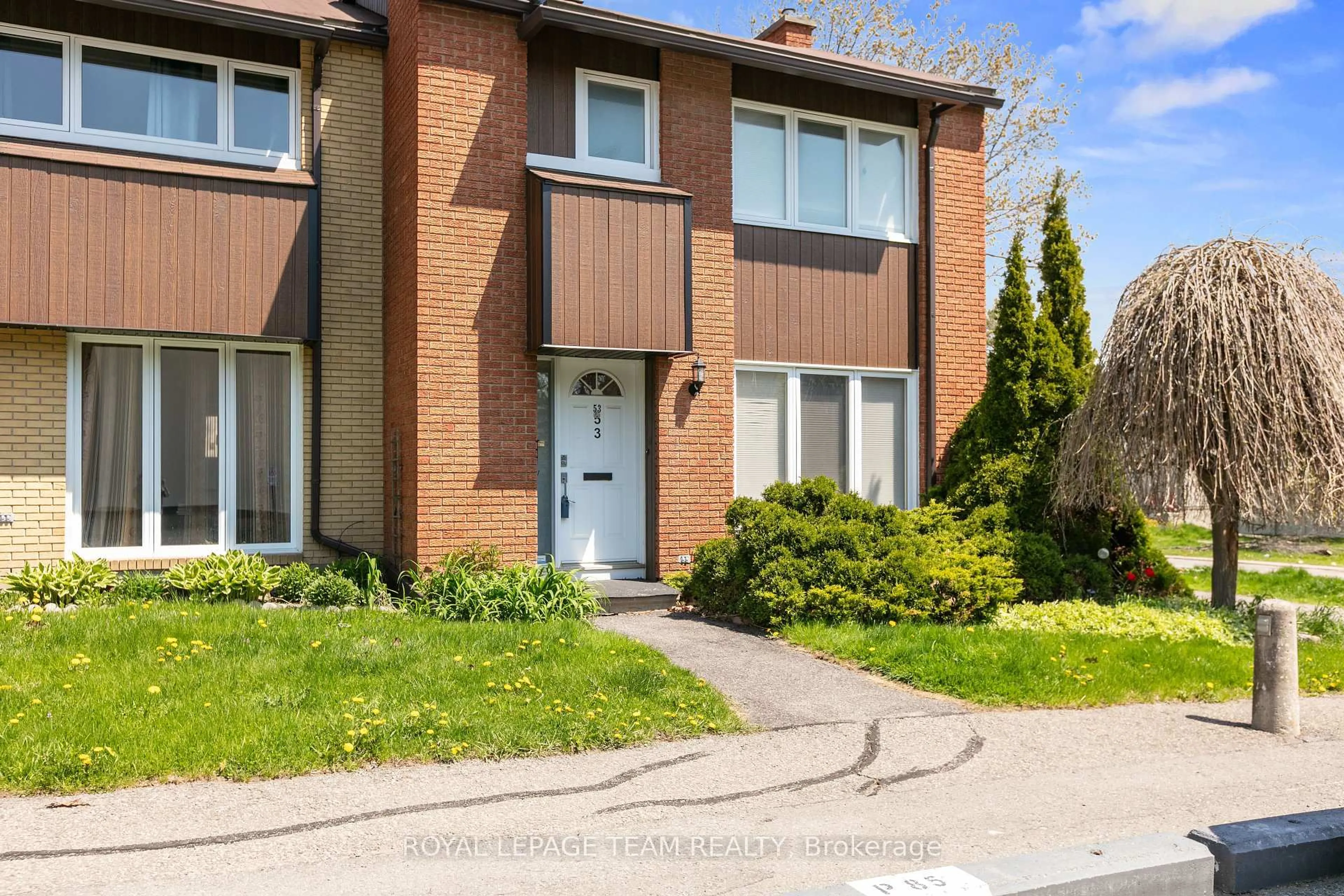 Home with brick exterior material, street for 1900 Marquis Ave #53, Ottawa Ontario K1J 8J2