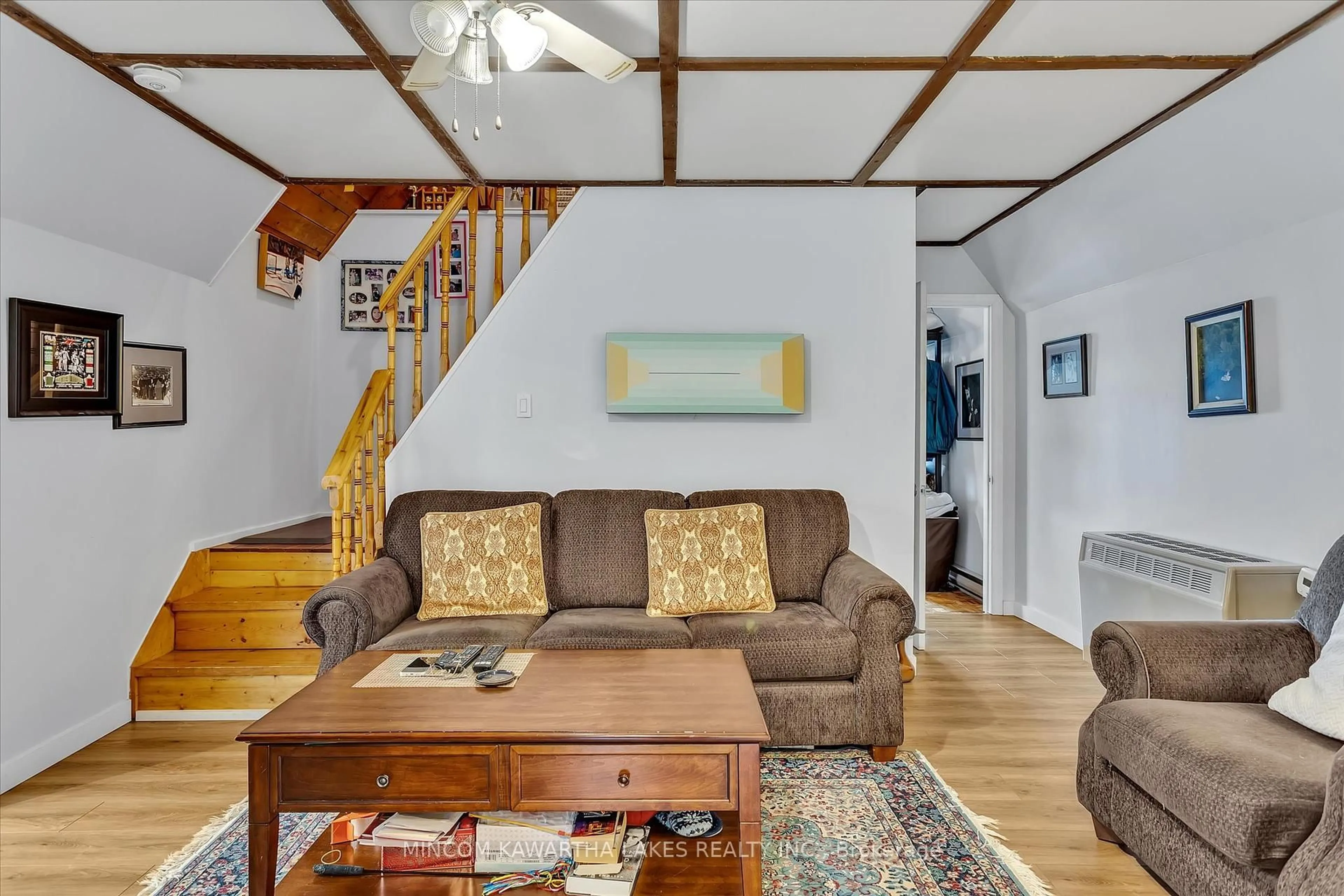 Living room with furniture, wood/laminate floor for 71 Fr 74a, North Kawartha Ontario K0L 1A0
