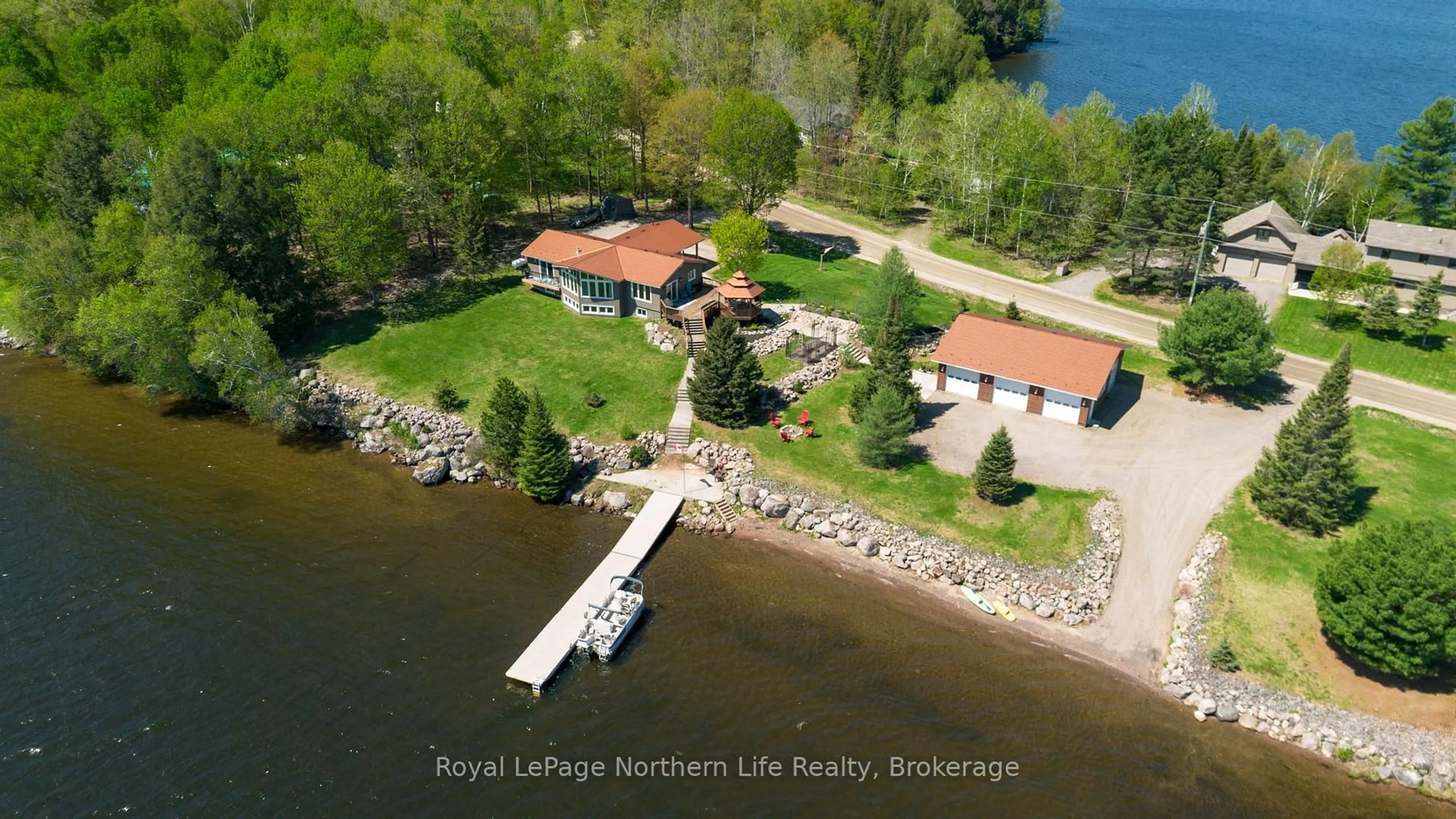 A pic from outside/outdoor area/front of a property/back of a property/a pic from drone, water/lake/river/ocean view for 701 Nosbonsing Park Rd, East Ferris Ontario P0H 1K0