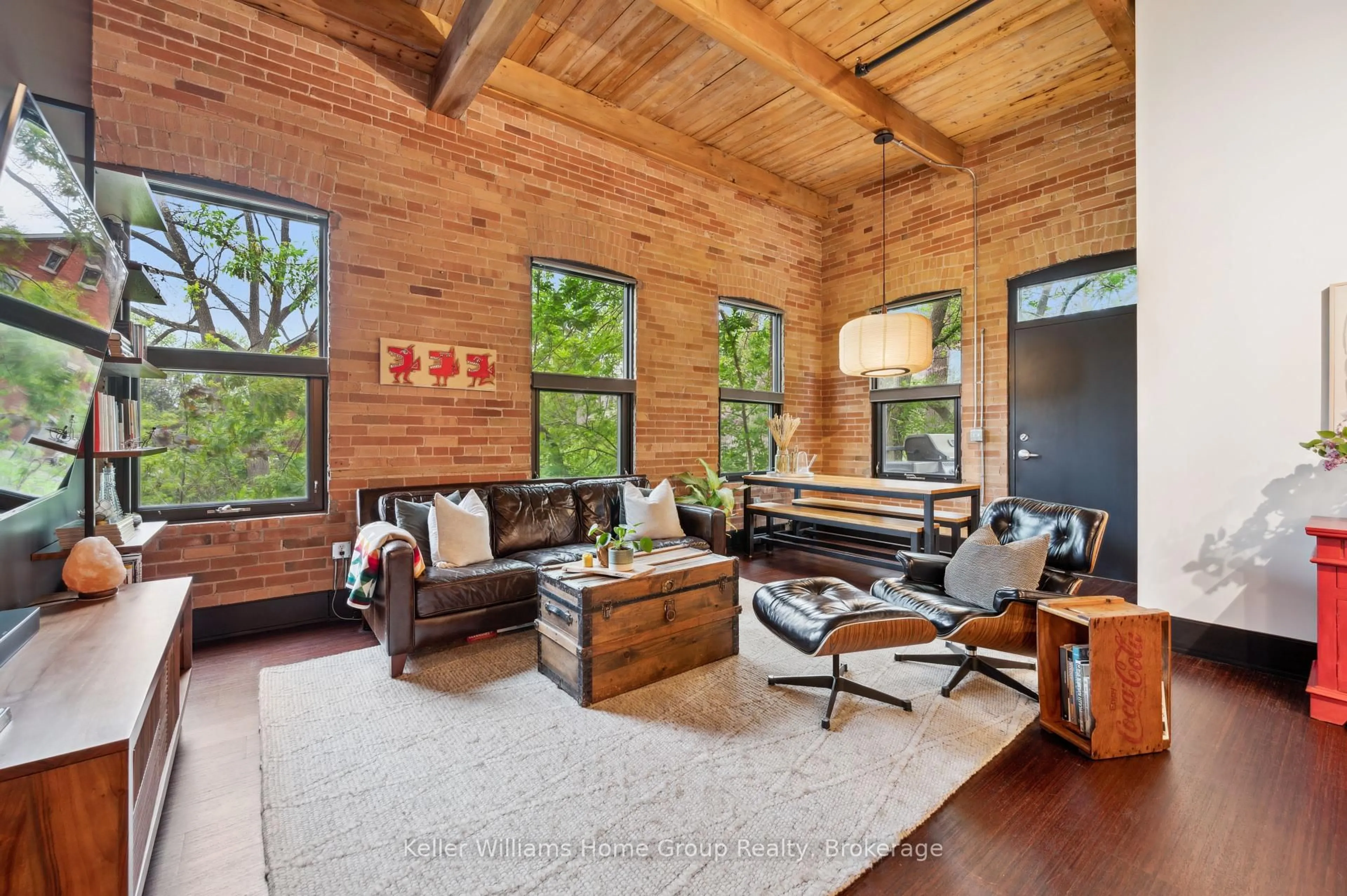 Living room with furniture, wood/laminate floor for 60 Cardigan St #207, Guelph Ontario N1H 3Z6