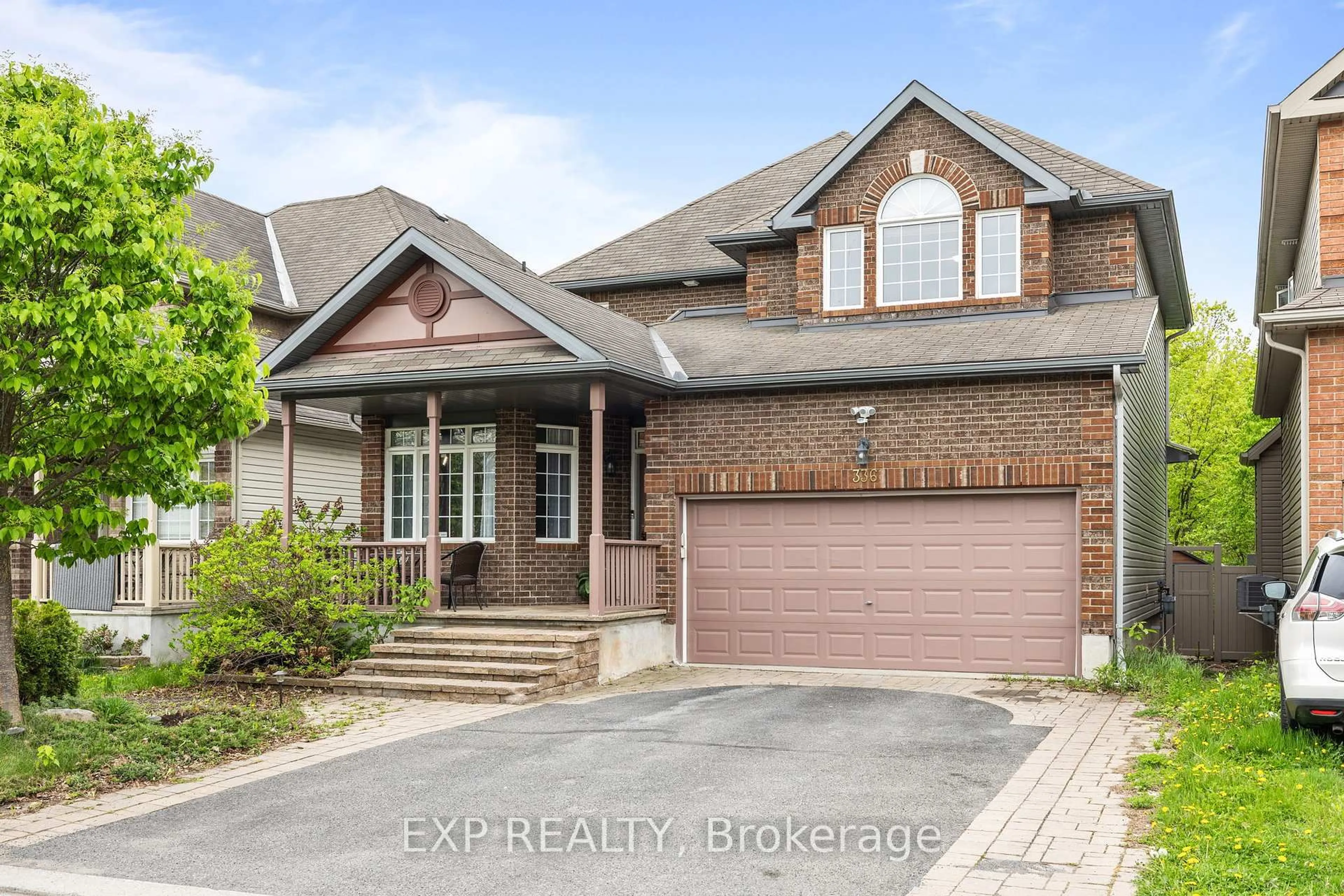 Home with brick exterior material, street for 336 Wisteria Cres, Ottawa Ontario K1V 0N5