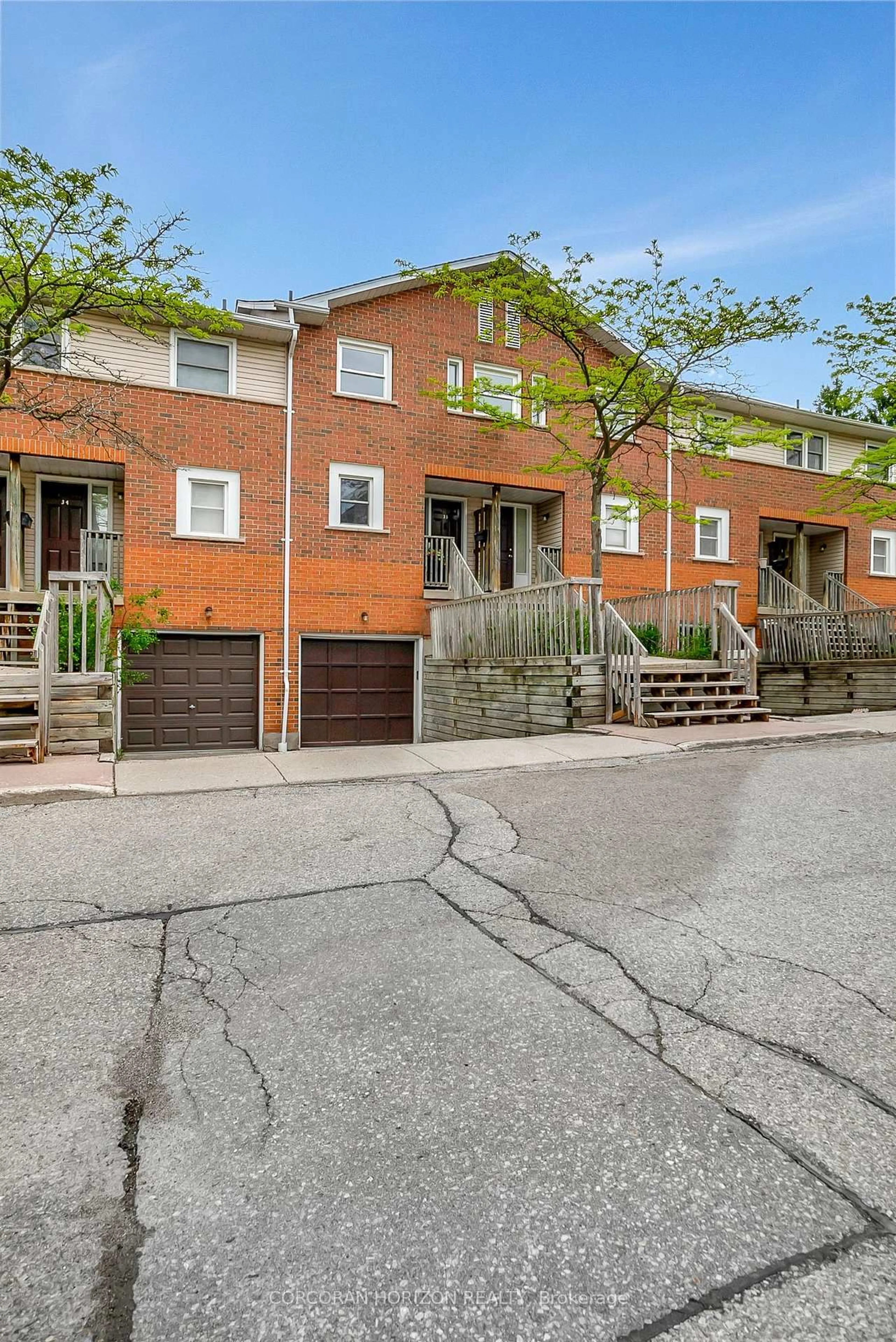 Home with brick exterior material, street for 459 Beechwood Pl #33, Waterloo Ontario N2T 2N8
