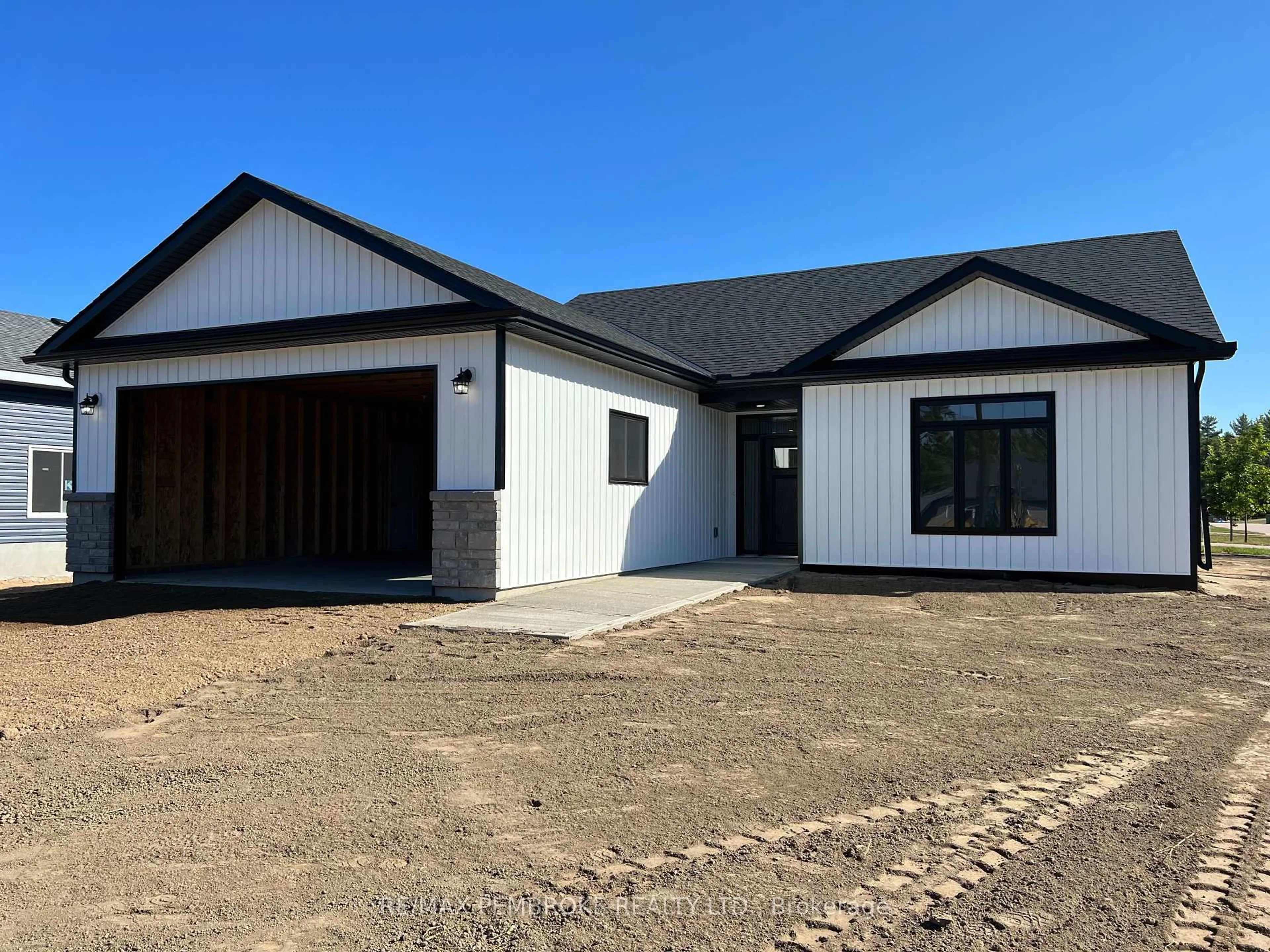 Home with vinyl exterior material, street for 4 Durant St, Petawawa Ontario K8H 0H3