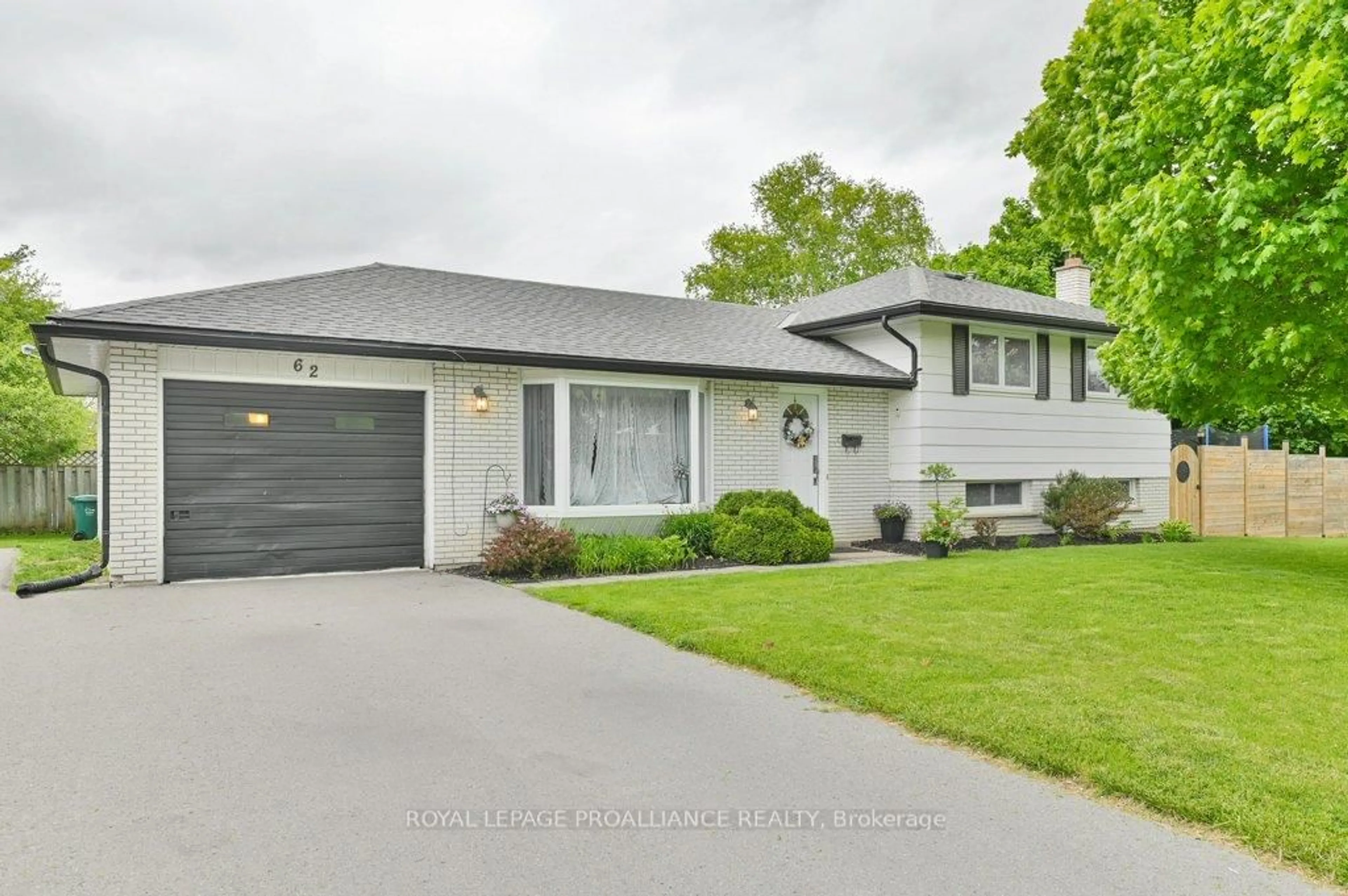 Home with vinyl exterior material, street for 62 Village Dr, Belleville Ontario K8P 4L5