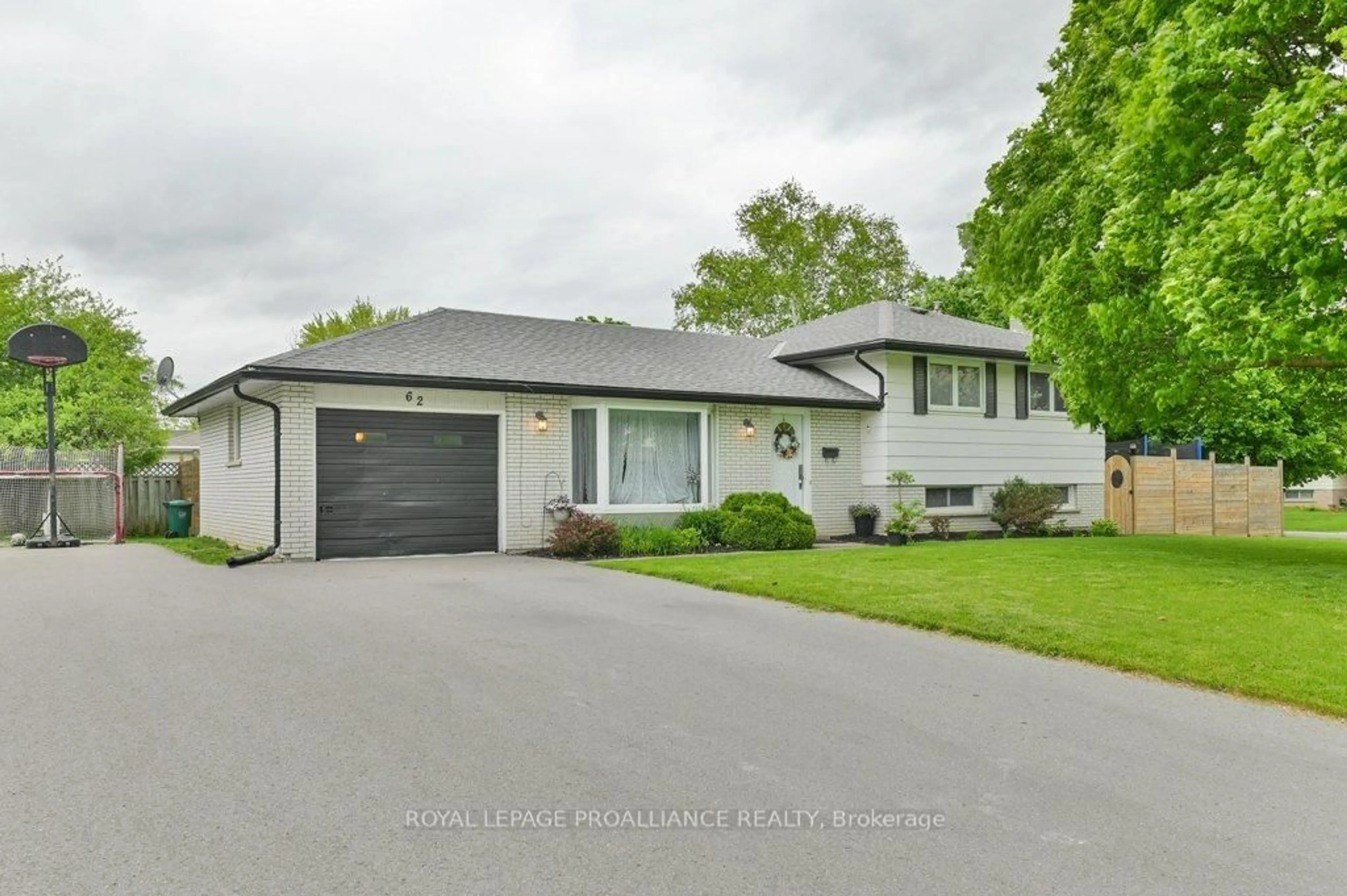 Home with vinyl exterior material, street for 62 Village Dr, Belleville Ontario K8P 4L5