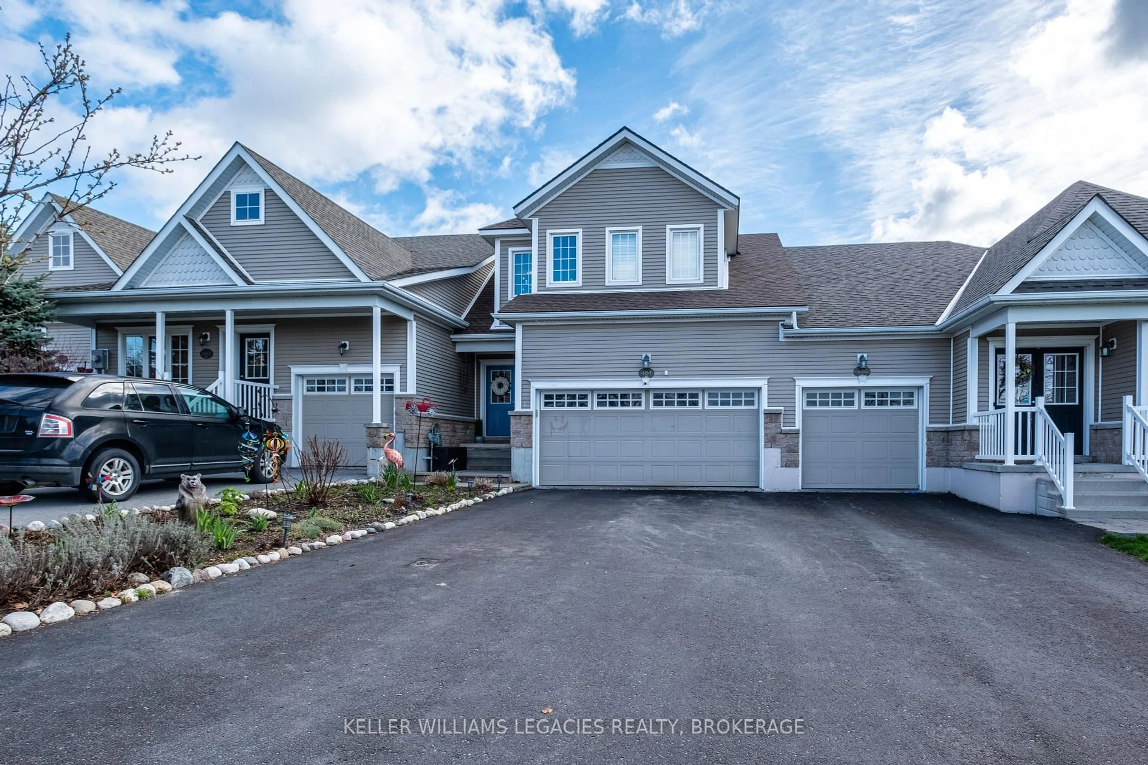 Home with vinyl exterior material, street for 484 Country Club Dr, Bath Ontario K0H 1G0