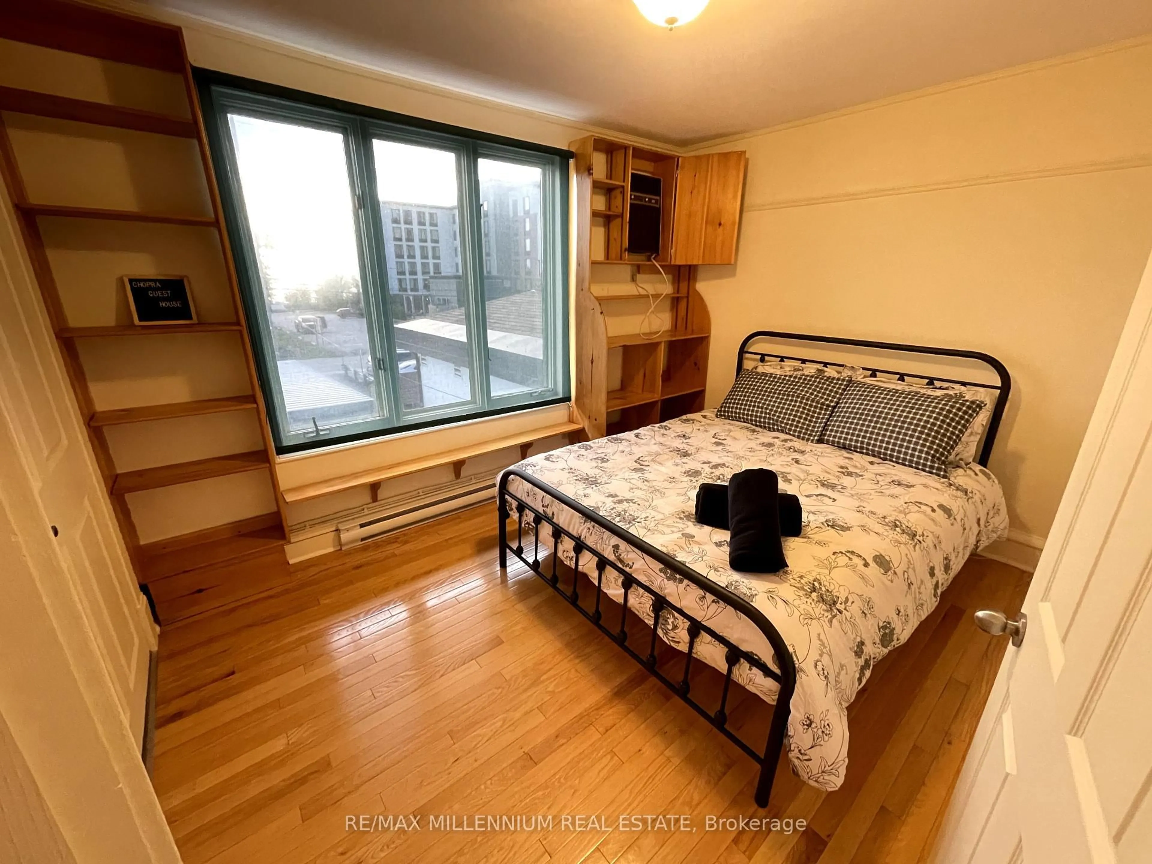 Bedroom with bed, wood/laminate floor for 437 Main St, North Bay Ontario P1B 2V3