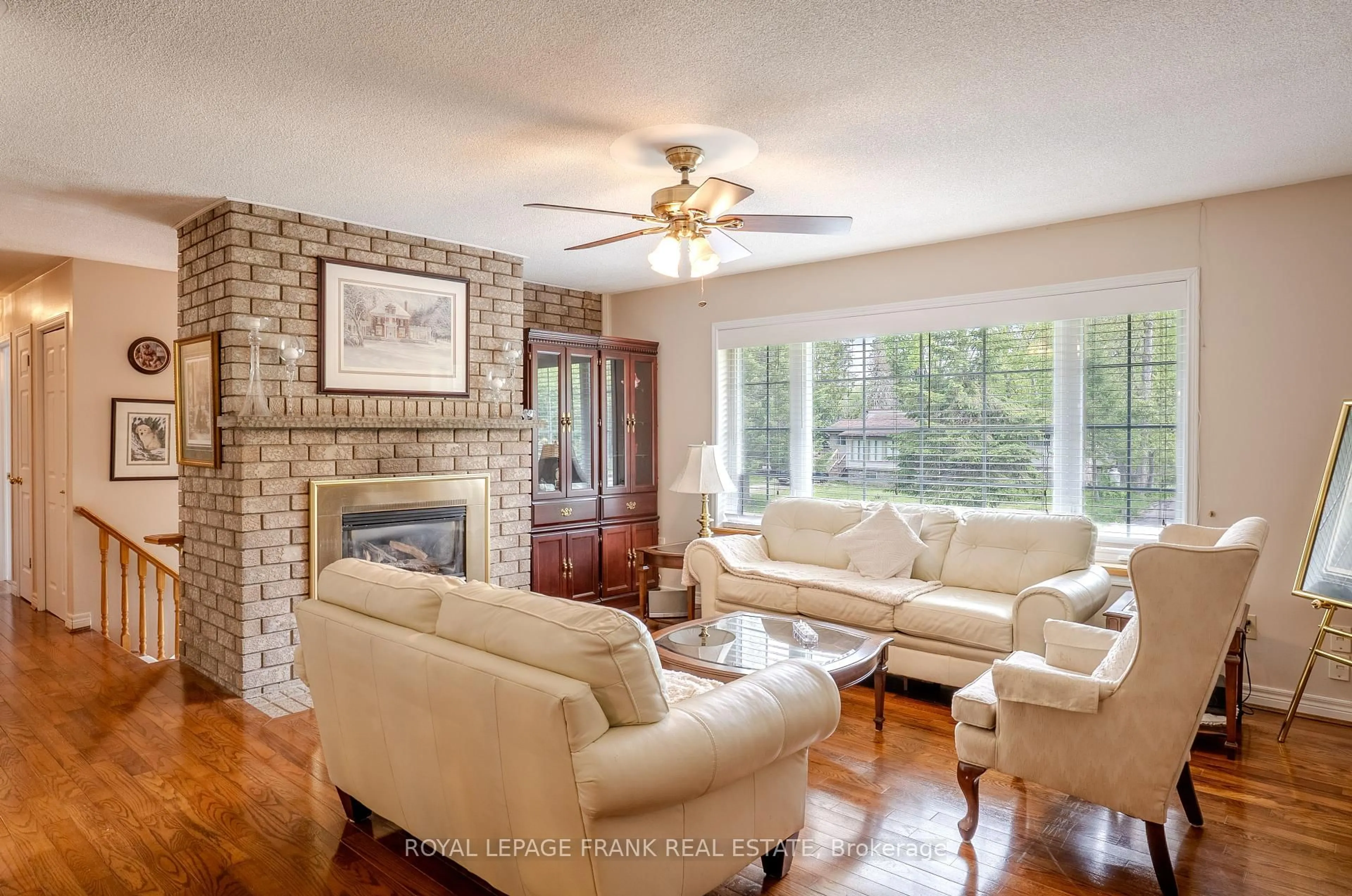 Living room with furniture, ceramic/tile floor for 97 Pirates Glen Dr, Trent Lakes Ontario K0M 1A0