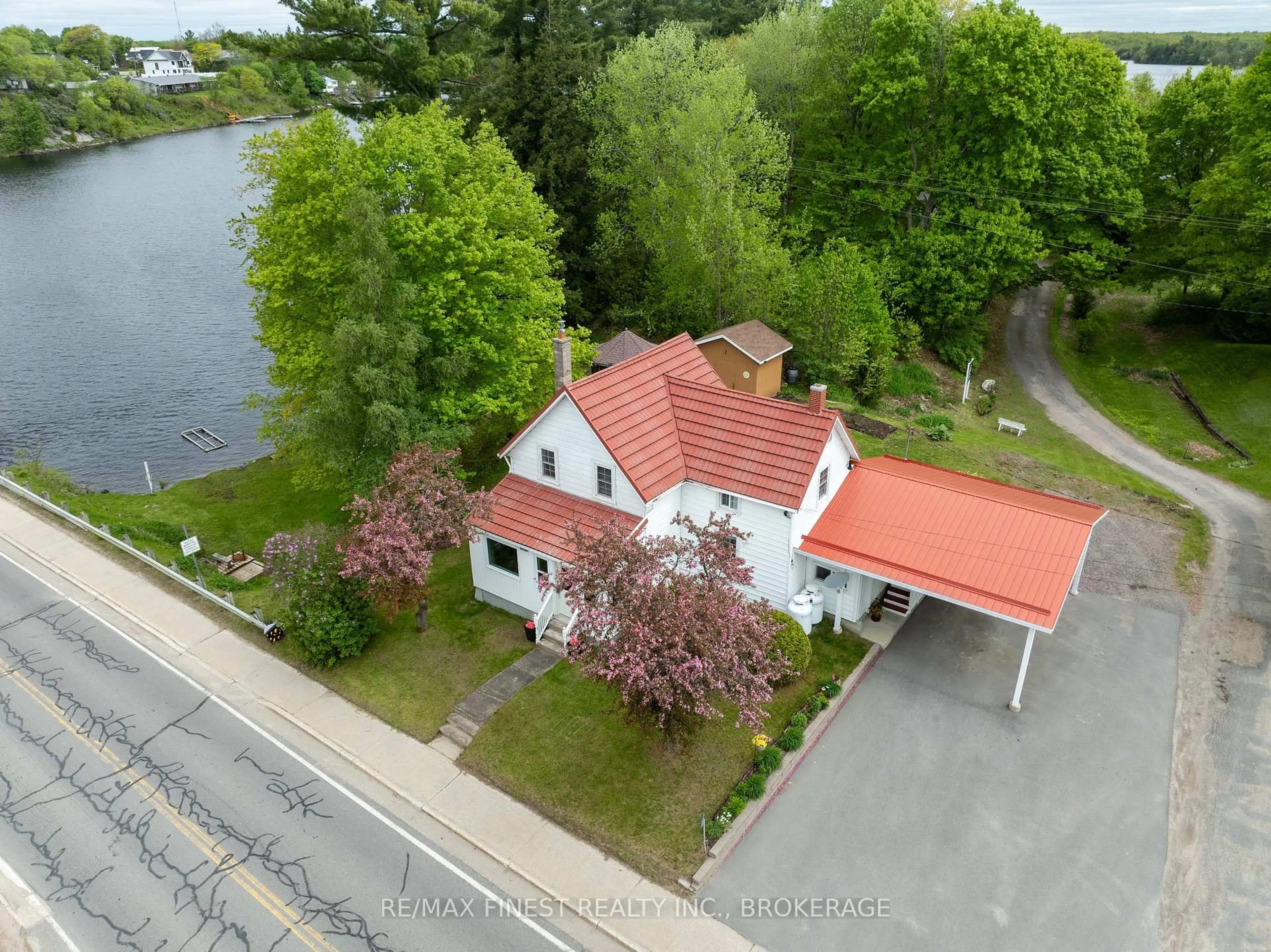 A pic from outside/outdoor area/front of a property/back of a property/a pic from drone, water/lake/river/ocean view for 14064 Road 38 N/A, Sharbot Lake Ontario K0H 2P0