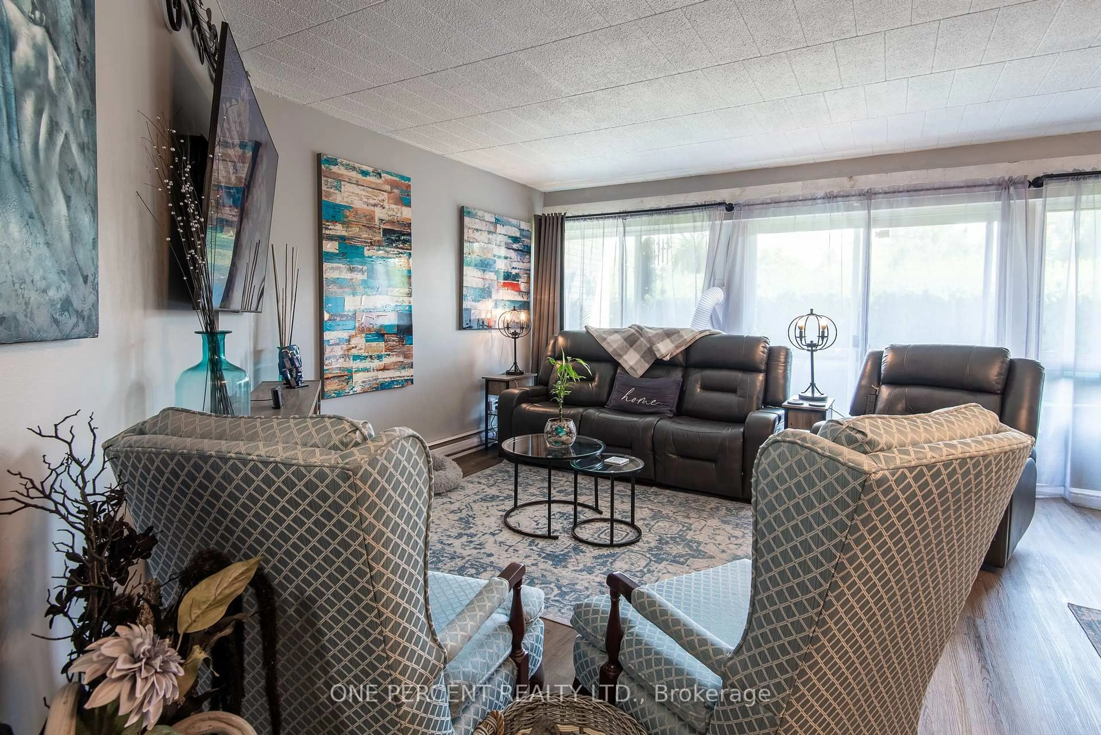 Living room with furniture, unknown for 105 Conroy Cres #103, Guelph Ontario N1G 2V5