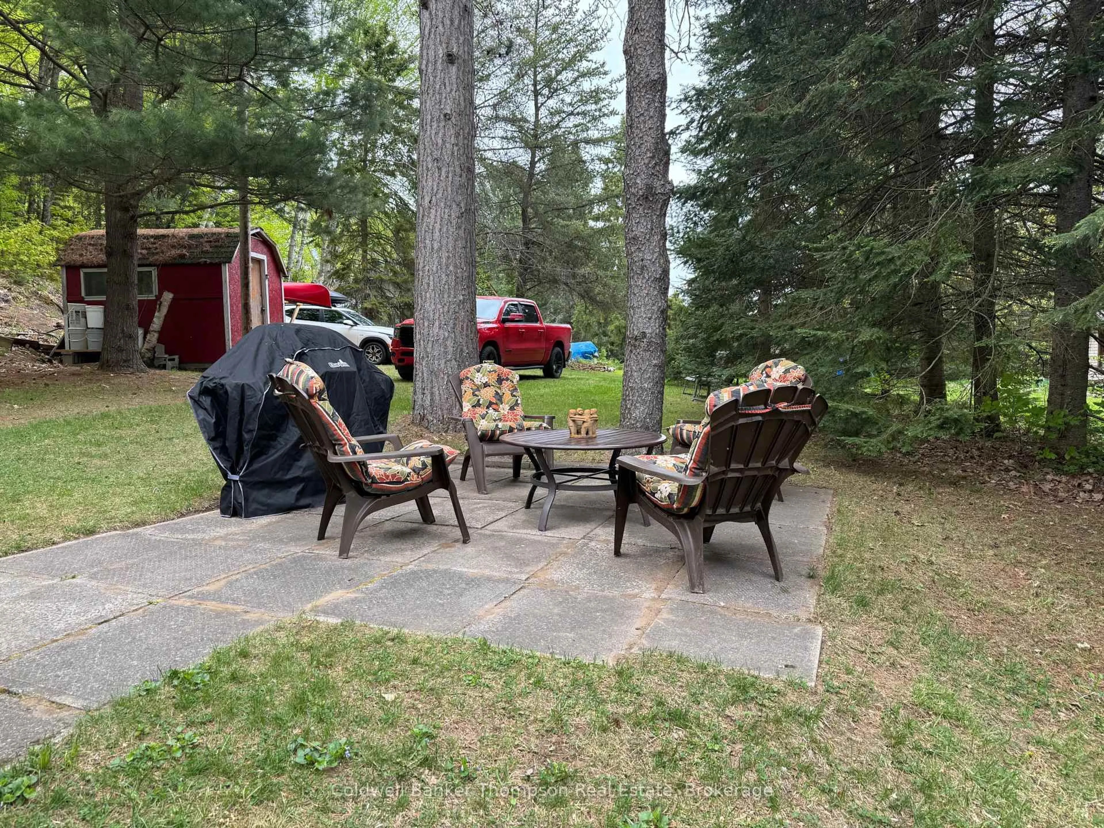 Patio, forest/trees view for 28 Spruce Lane, Perry Ontario P0A 1J0
