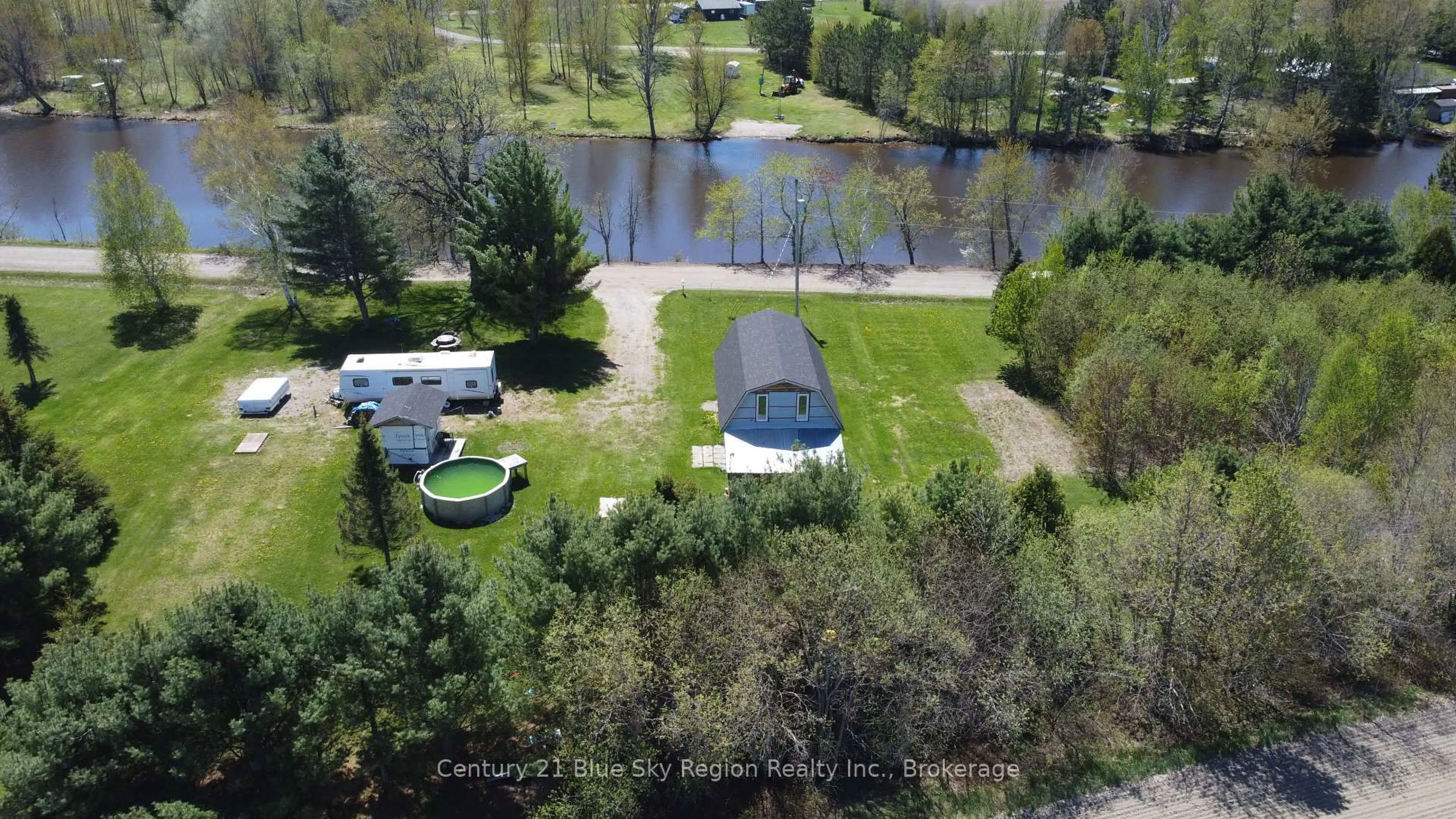 A pic from outside/outdoor area/front of a property/back of a property/a pic from drone, water/lake/river/ocean view for 37 Veuve River Rd, West Nipissing Ontario P0H 2M0