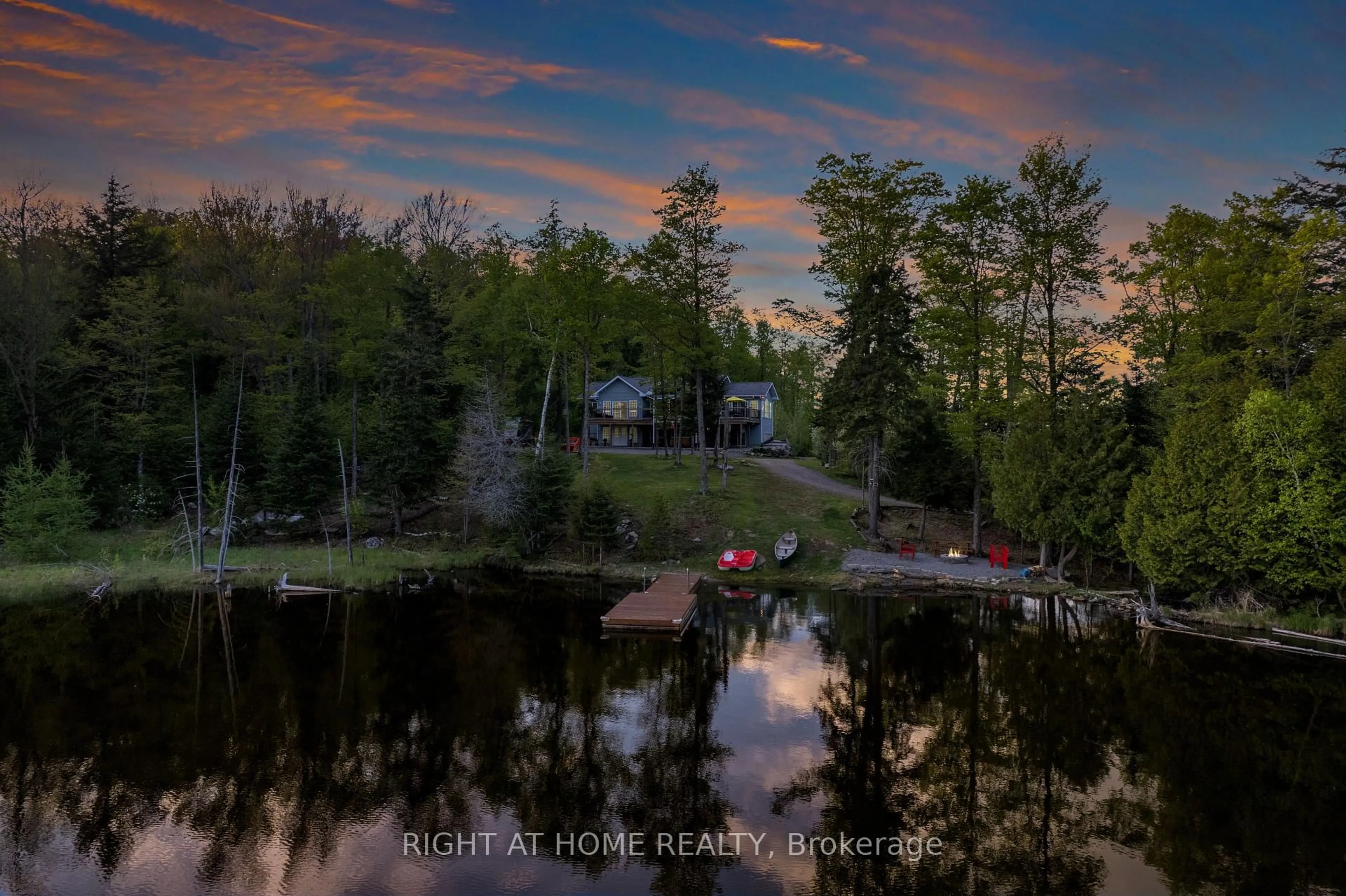 A pic from outside/outdoor area/front of a property/back of a property/a pic from drone, water/lake/river/ocean view for 1181 Grace River Rd, Dysart et al Ontario K0L 3C0