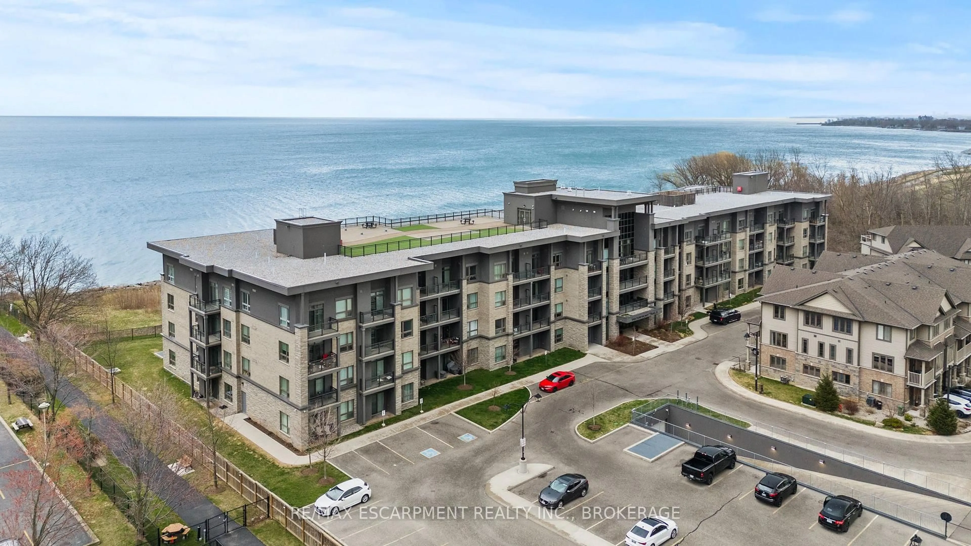 A pic from outside/outdoor area/front of a property/back of a property/a pic from drone, water/lake/river/ocean view for 35 Southshore Cres #230, Hamilton Ontario L8E 0J2