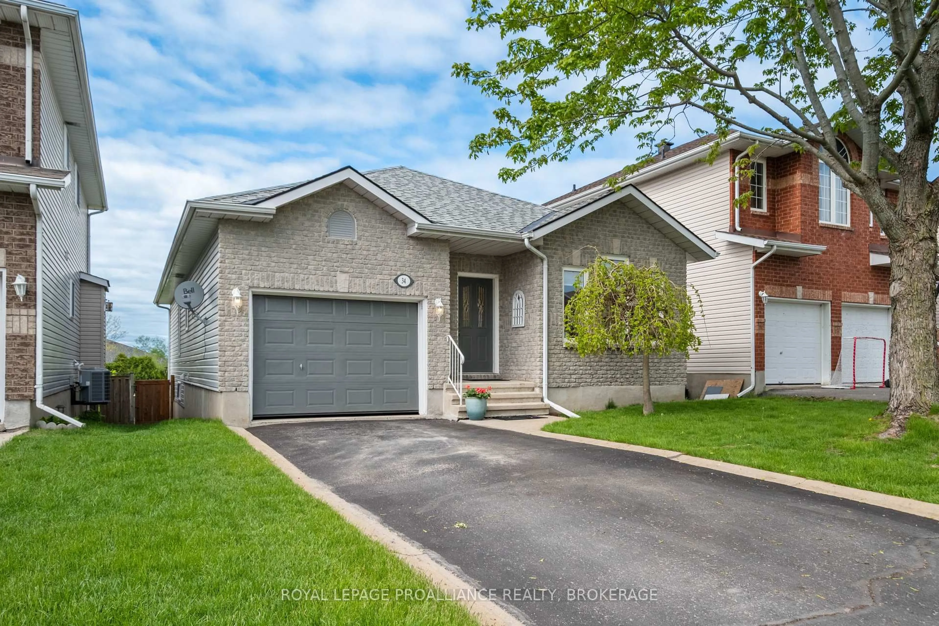 Home with brick exterior material, street for 34 Schooner Dr, Kingston Ontario K7K 7J8