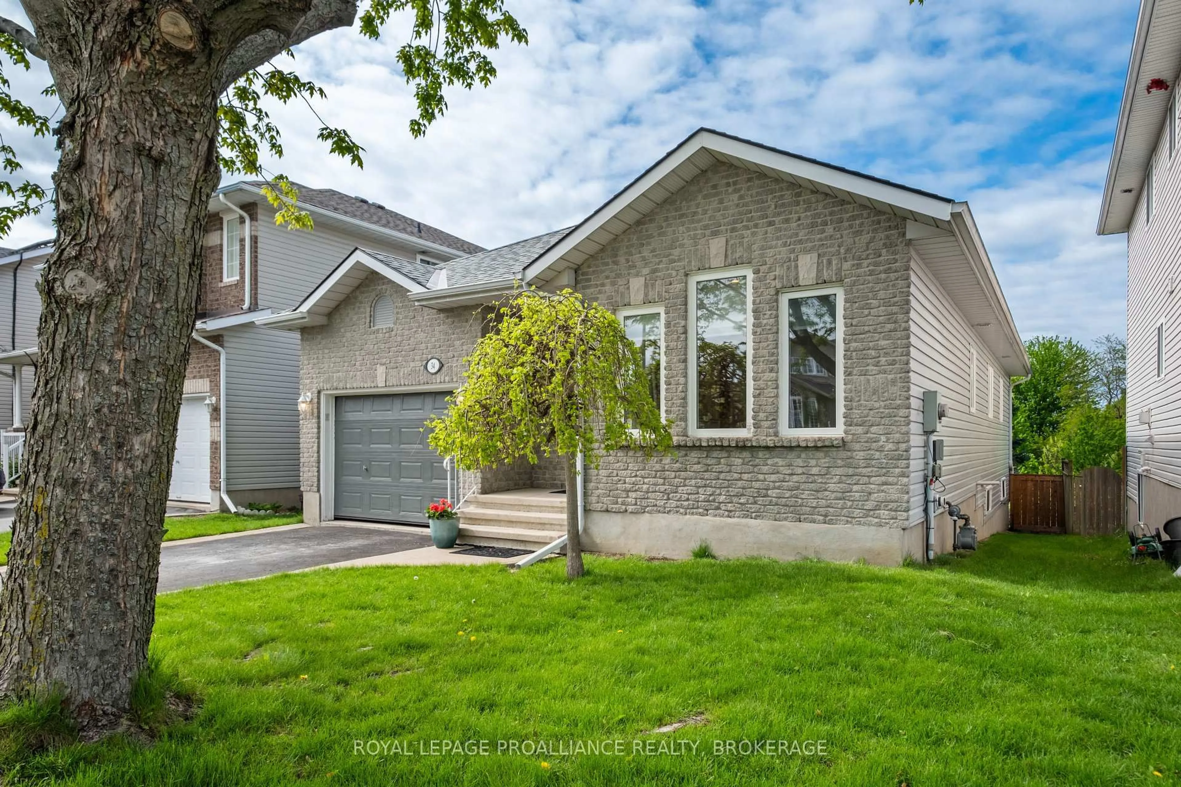 Home with brick exterior material, street for 34 Schooner Dr, Kingston Ontario K7K 7J8