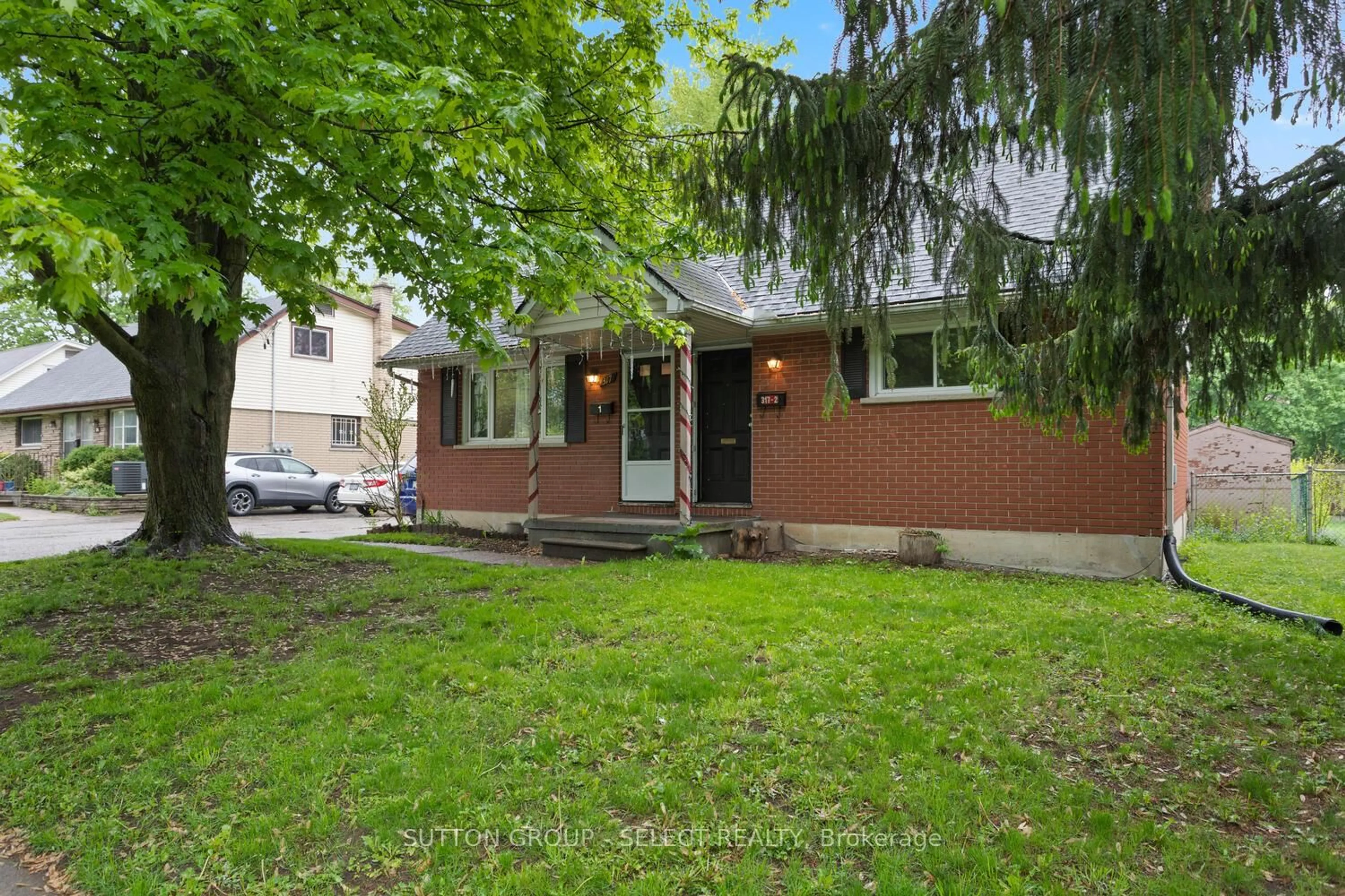 Home with brick exterior material, street for 317 Belfield St, London East Ontario N5Y 2J9