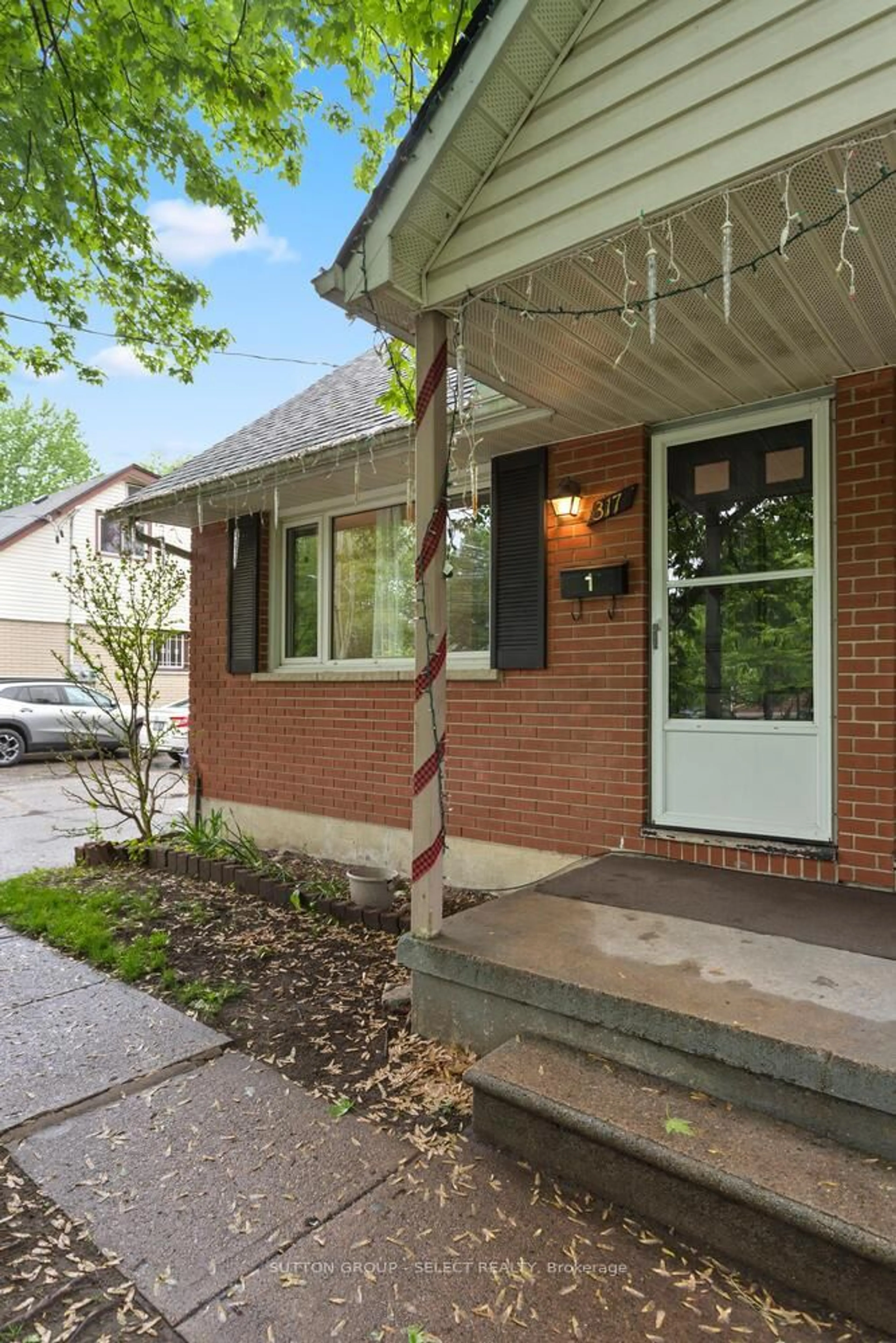 Home with brick exterior material, street for 317 Belfield St, London East Ontario N5Y 2J9