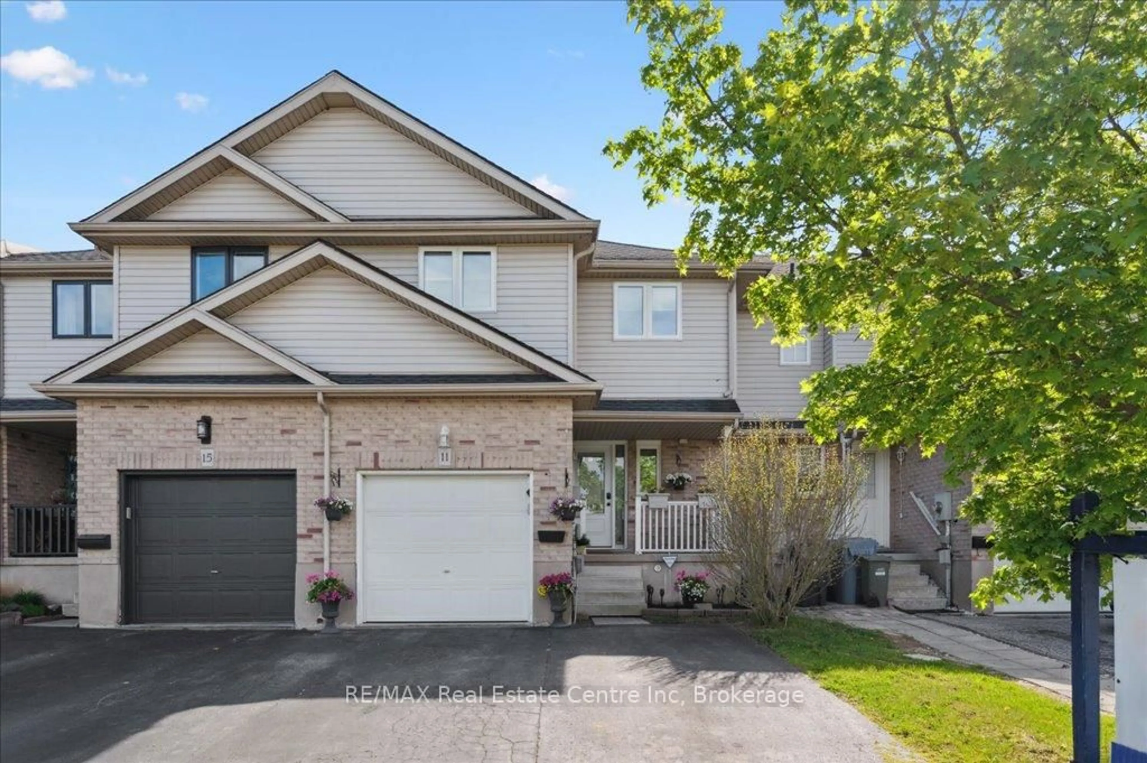 Home with vinyl exterior material, street for 11 CANDLEWOOD Dr, Guelph Ontario N1K 1W2