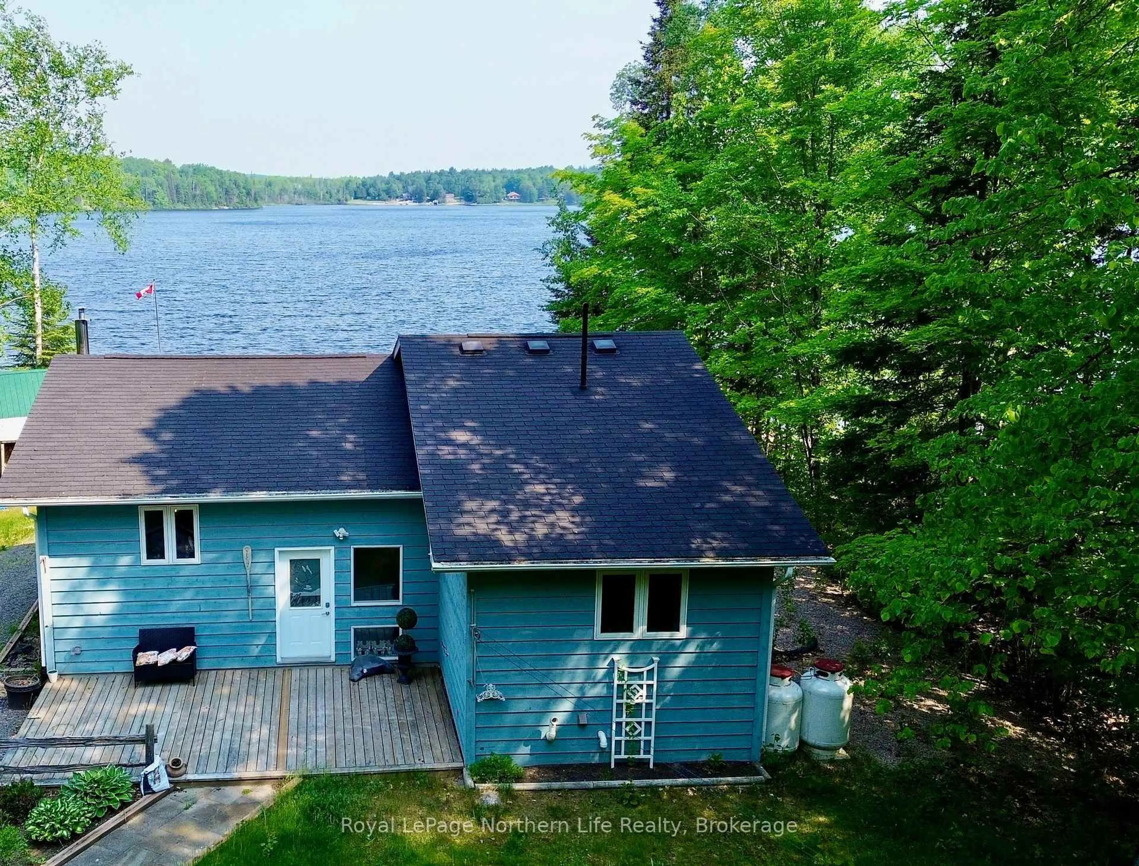 A pic from outside/outdoor area/front of a property/back of a property/a pic from drone, water/lake/river/ocean view for 448 Swalwells Dr, Nipissing Ontario P0H 1W0