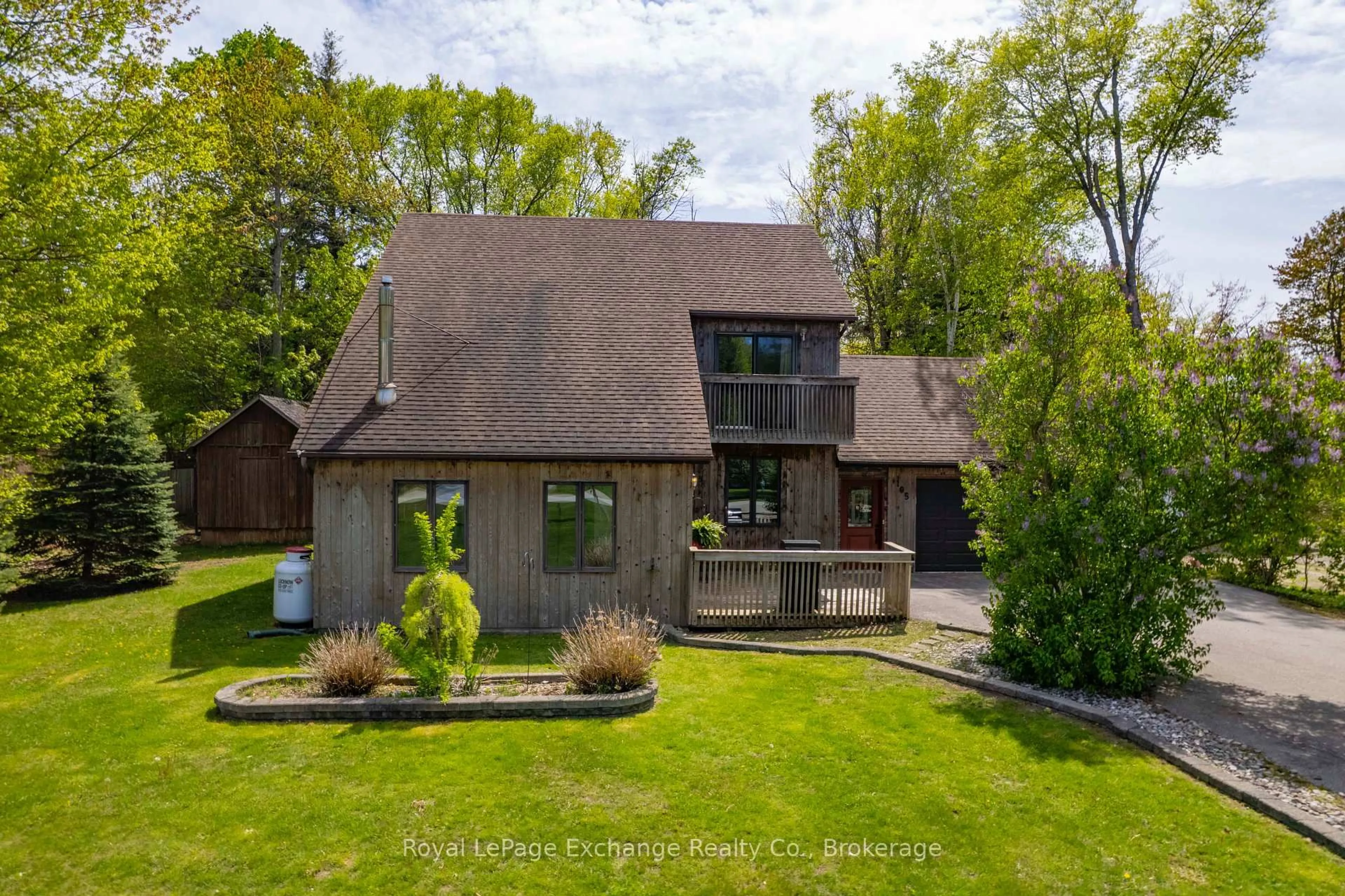 A pic from outside/outdoor area/front of a property/back of a property/a pic from drone, street for 105 Lurgan Lane, Huron-Kinloss Ontario N2Z 2X3
