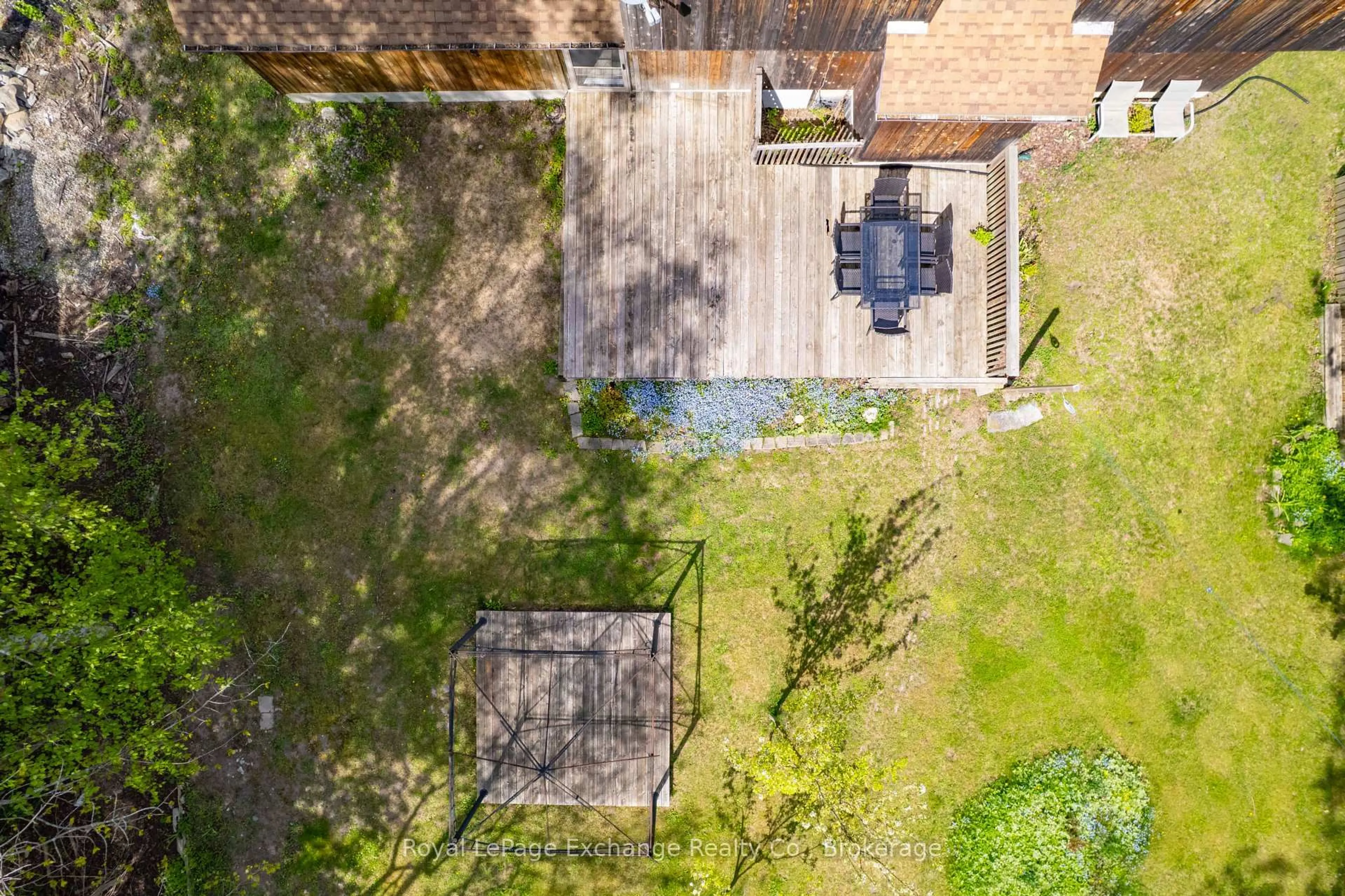 A pic from outside/outdoor area/front of a property/back of a property/a pic from drone, unknown for 105 Lurgan Lane, Huron-Kinloss Ontario N2Z 2X3