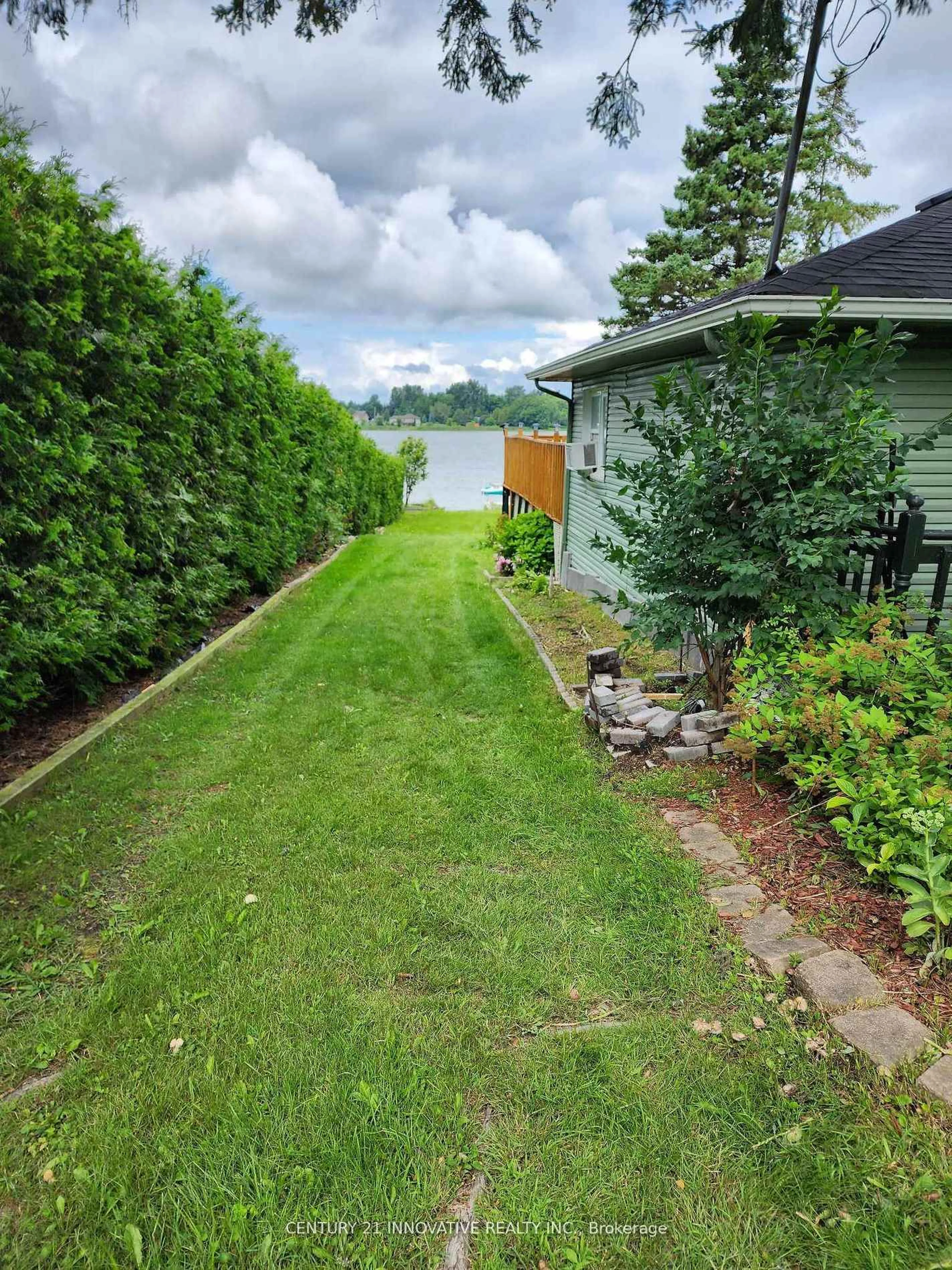 A pic from outside/outdoor area/front of a property/back of a property/a pic from drone, water/lake/river/ocean view for 73 Loon St, Kawartha Lakes Ontario L0B 1K0