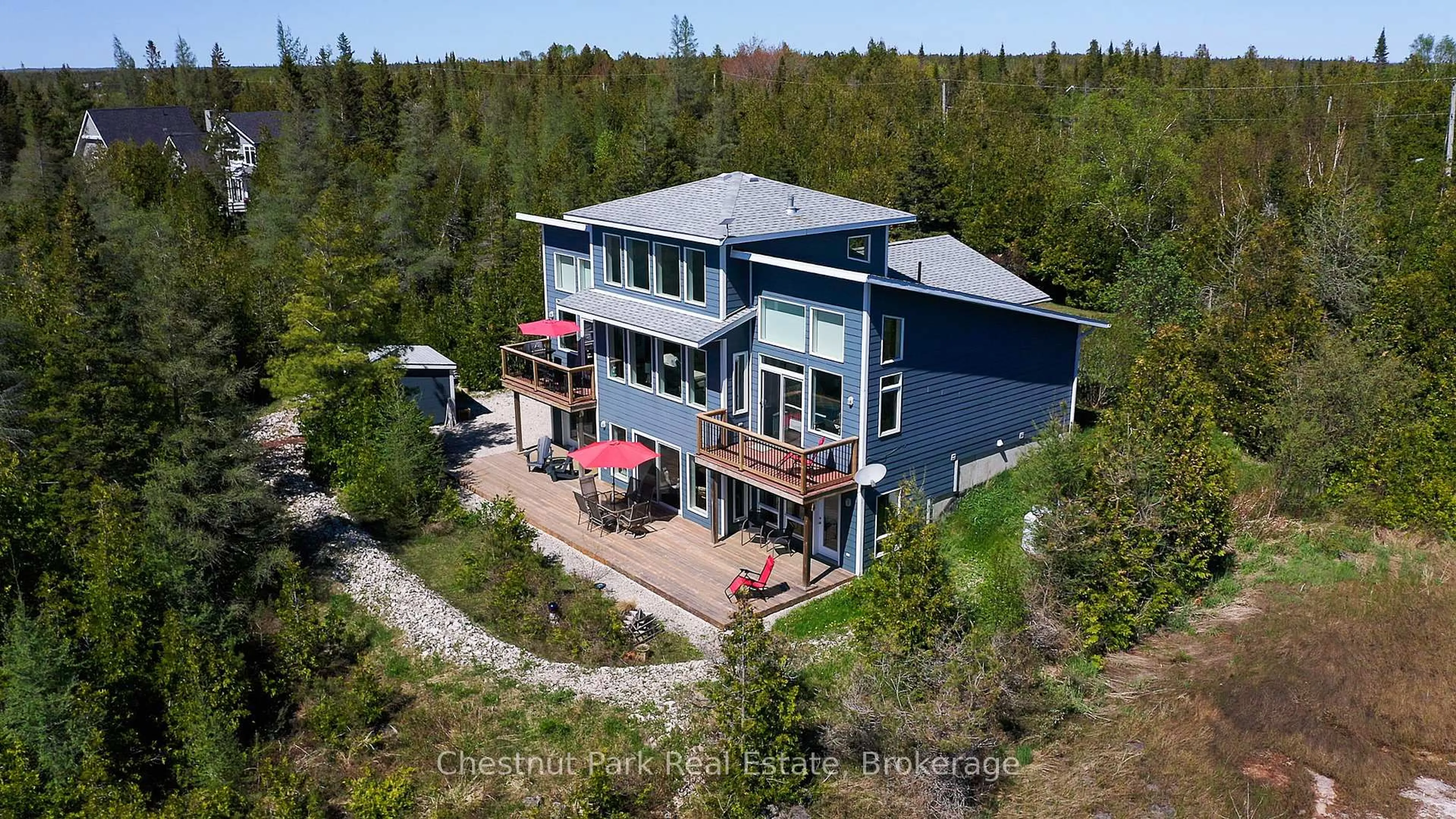 A pic from outside/outdoor area/front of a property/back of a property/a pic from drone, unknown for 84 Silversides Point Rd, Northern Bruce Peninsula Ontario N0H 1Z0