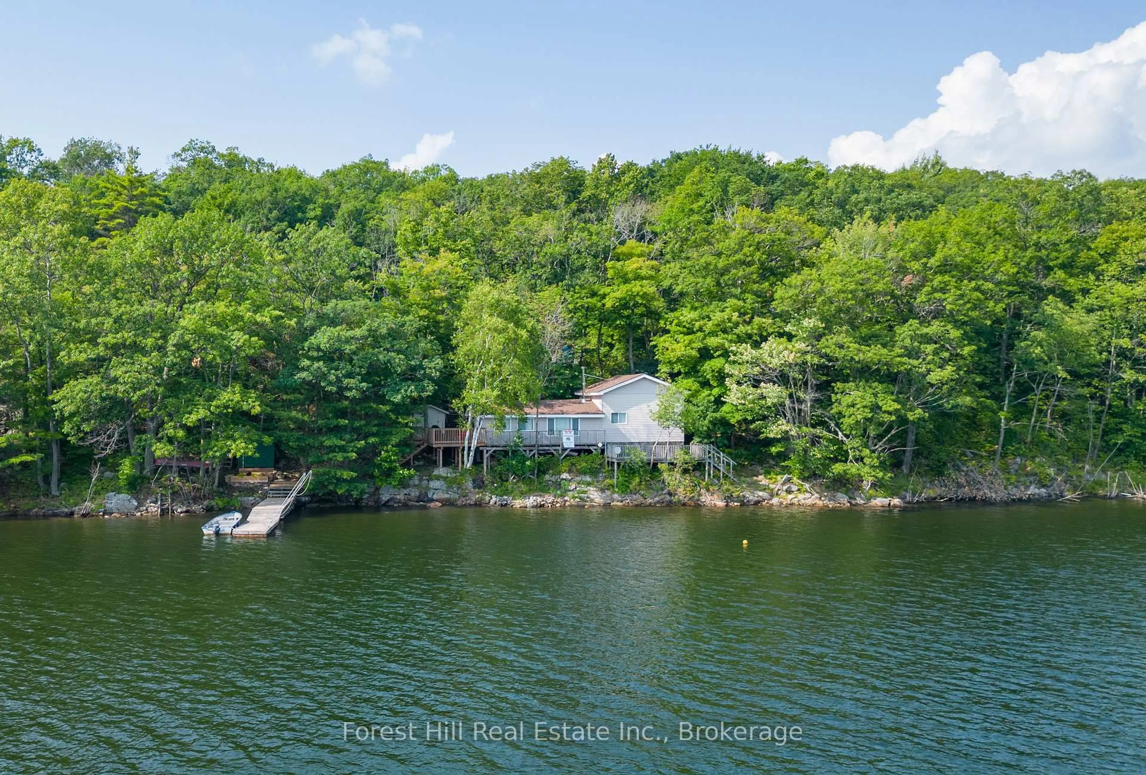 A pic from outside/outdoor area/front of a property/back of a property/a pic from drone, water/lake/river/ocean view for 959 HARRISON Tr, Georgian Bay Ontario P0C 1H0