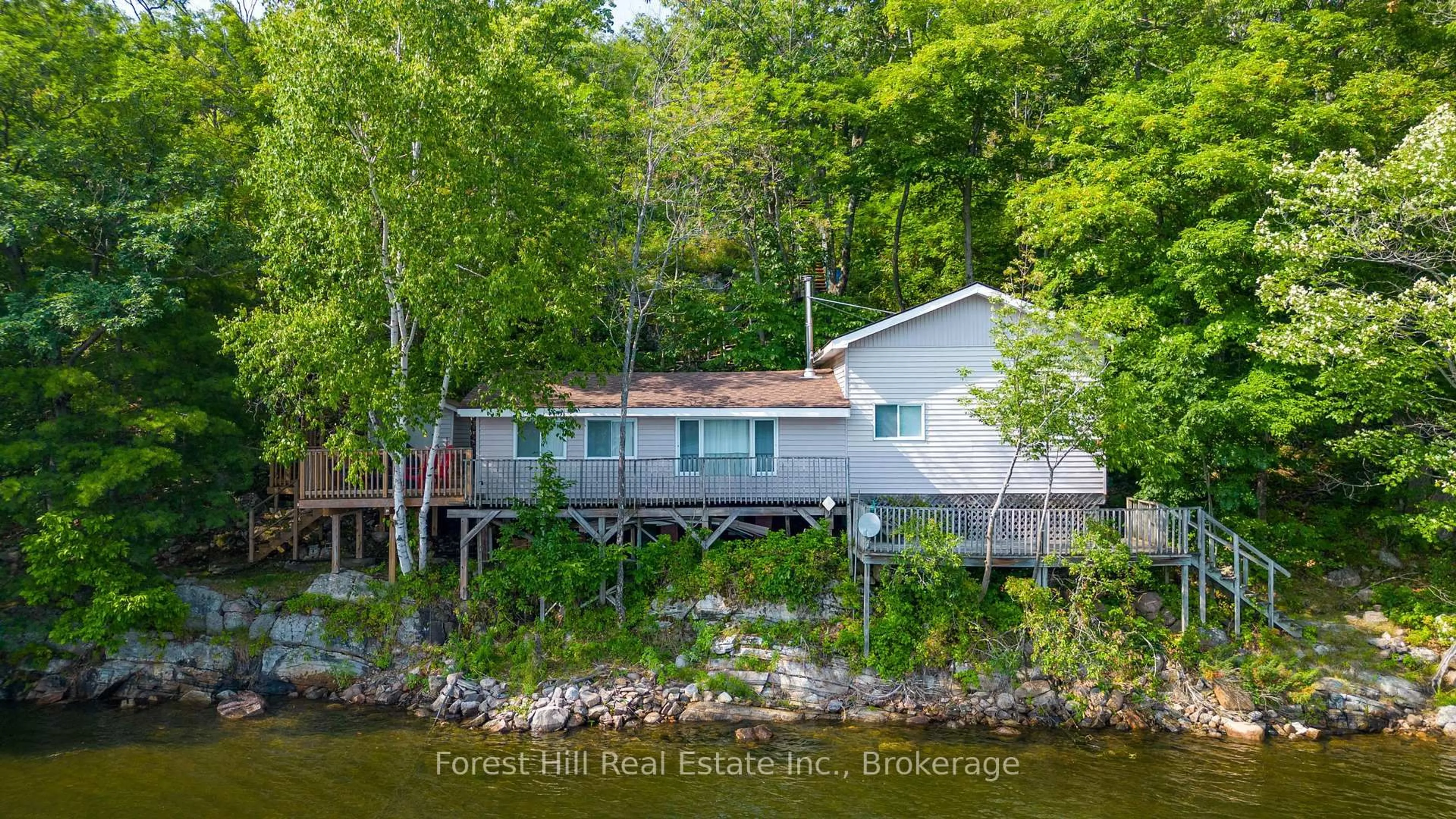 A pic from outside/outdoor area/front of a property/back of a property/a pic from drone, water/lake/river/ocean view for 959 HARRISON Tr, Georgian Bay Ontario P0C 1H0