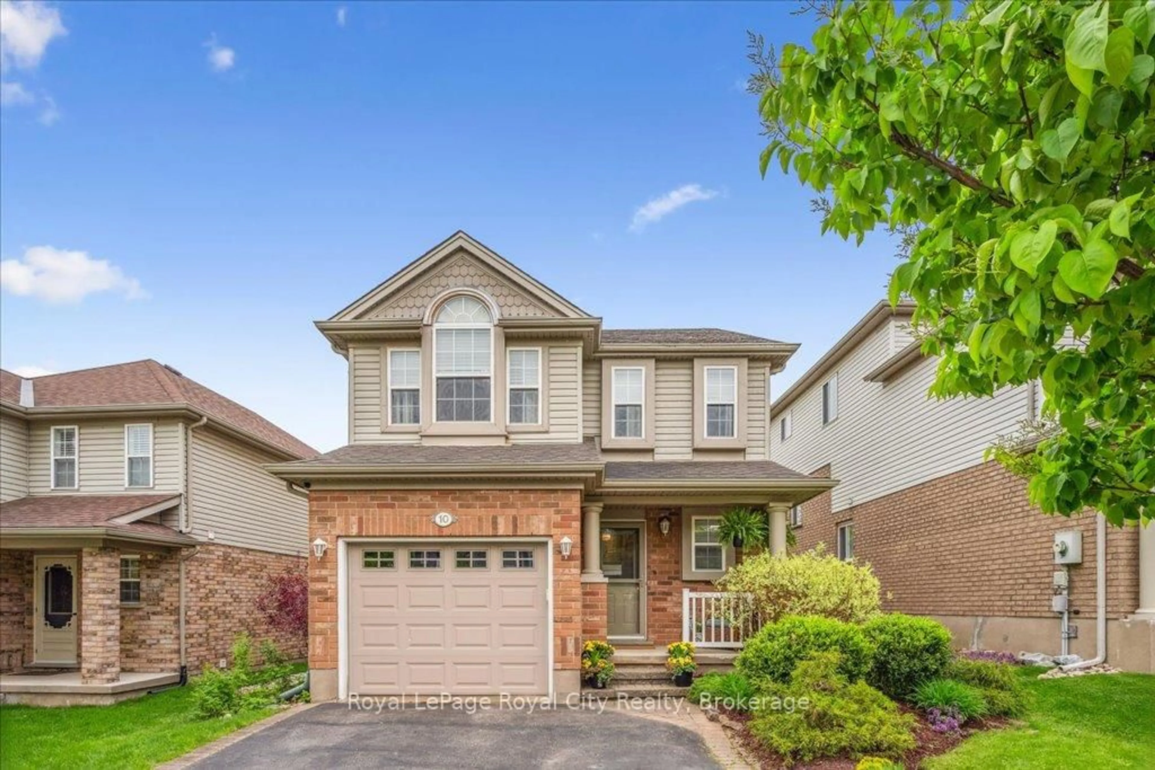 Home with brick exterior material, street for 10 O'CONNOR Lane, Guelph Ontario N1E 7G5