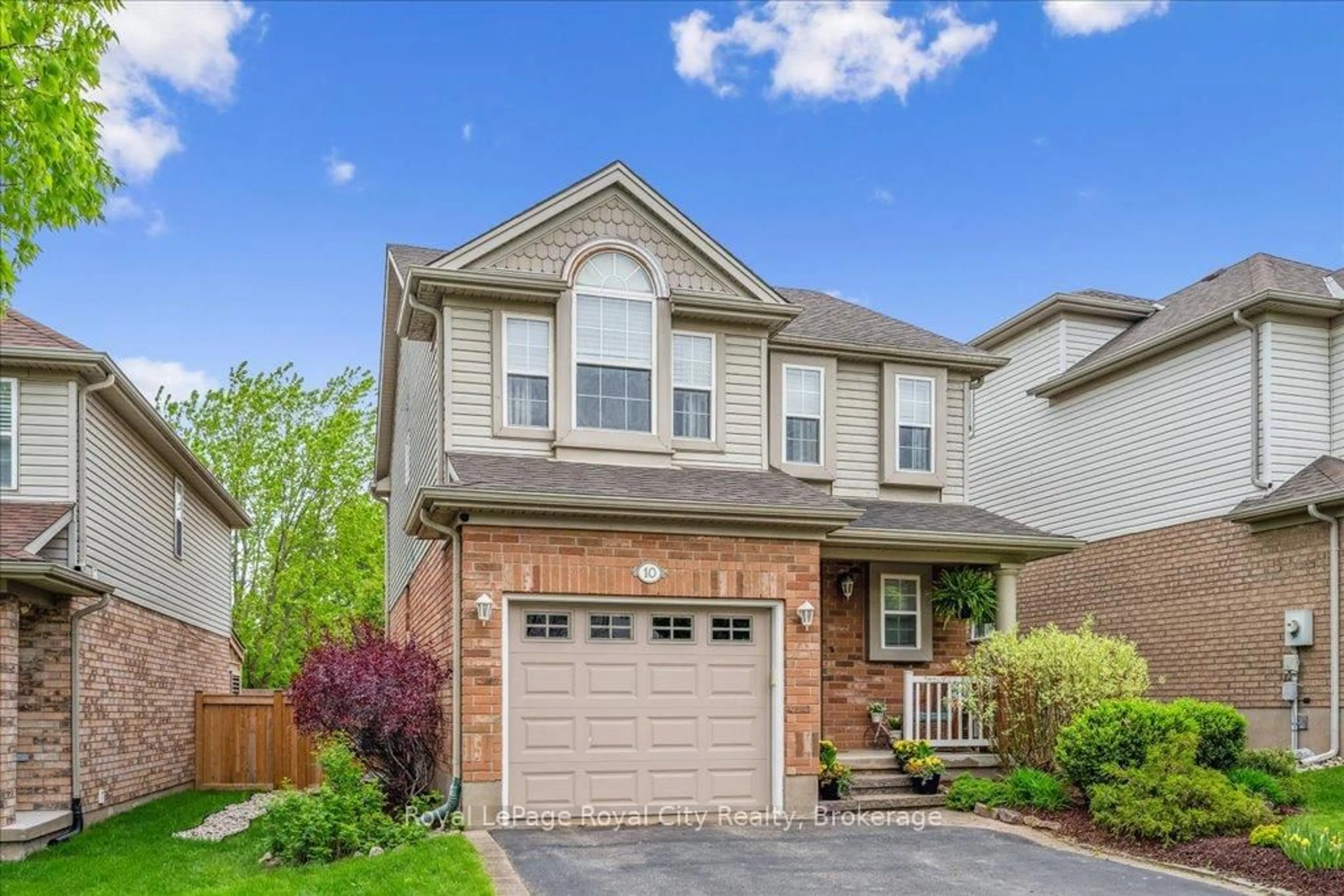 Home with brick exterior material, street for 10 O'CONNOR Lane, Guelph Ontario N1E 7G5