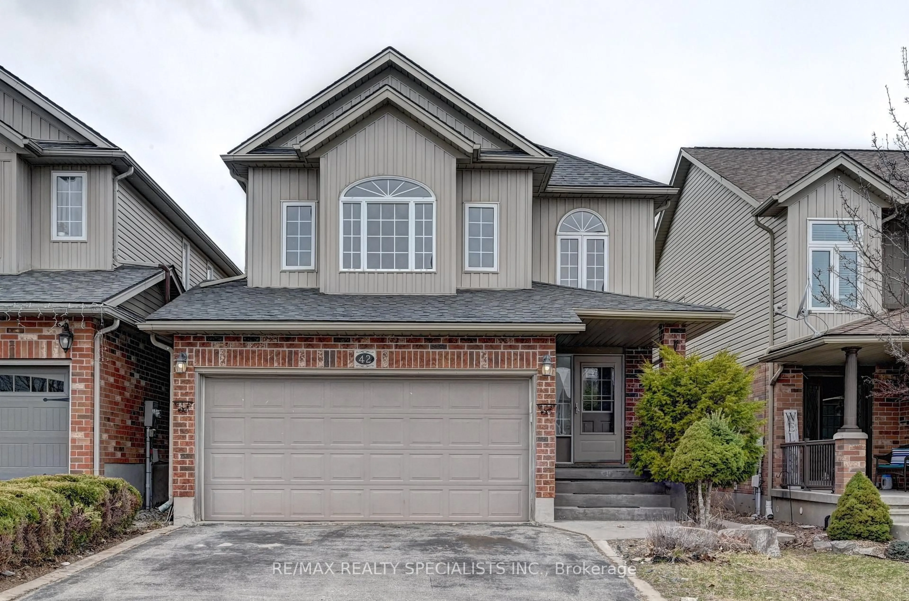 Home with brick exterior material, street for 42 Bridleridge St, Kitchener Ontario N2P 2V1
