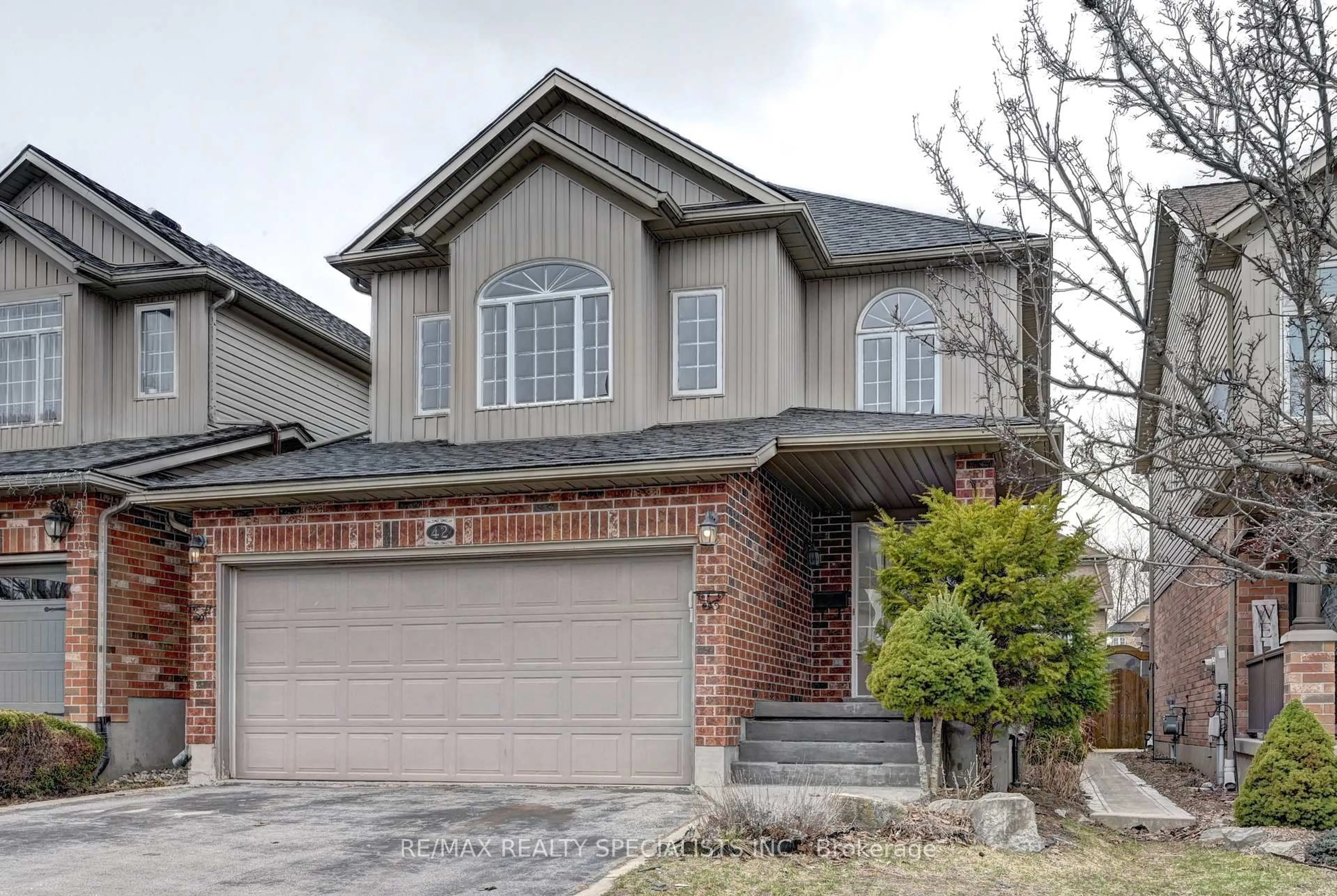 Home with brick exterior material, street for 42 Bridleridge St, Kitchener Ontario N2P 2V1