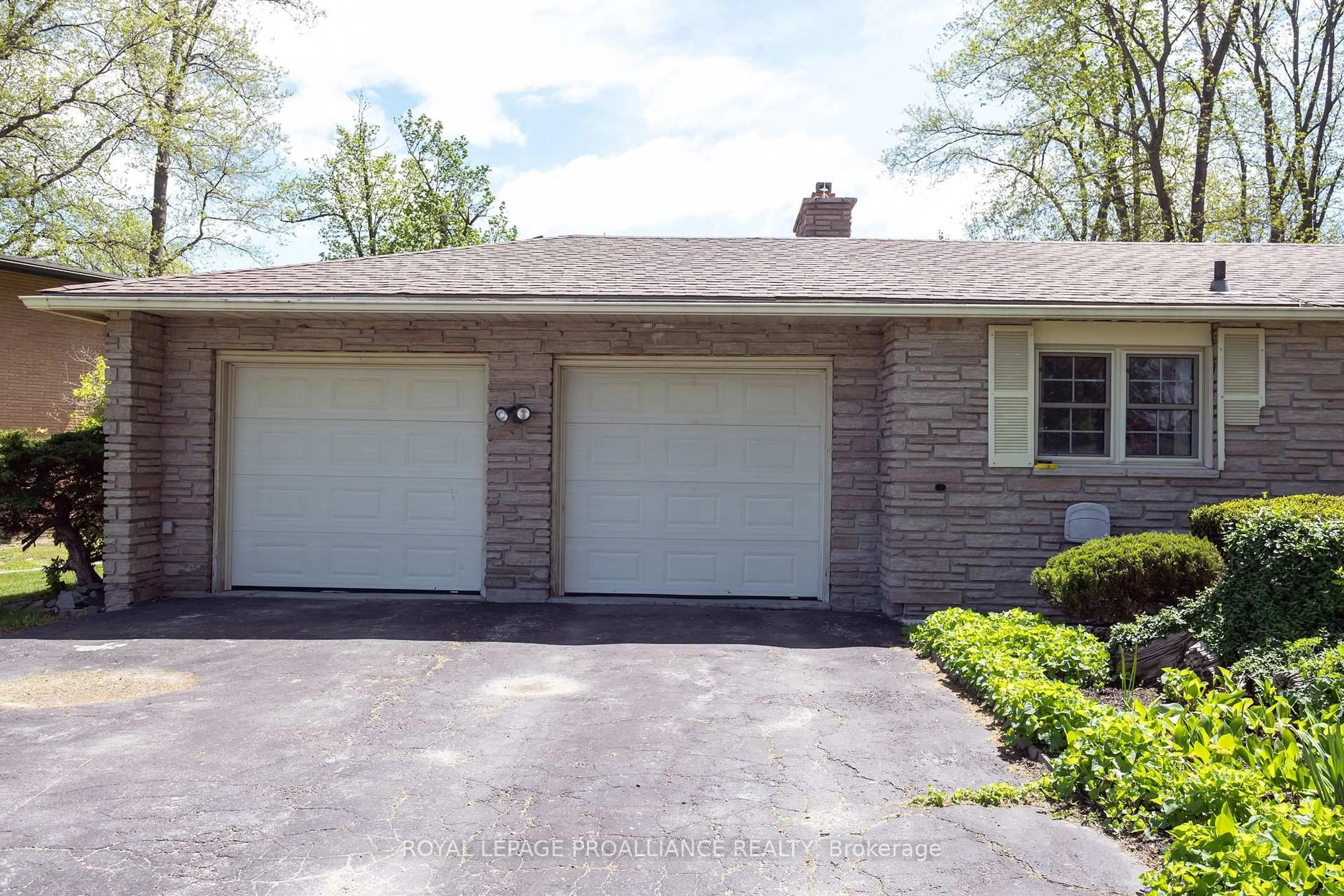Home with brick exterior material, street for 40 Fenwood Cres, Prince Edward County Ontario K8N 4Z7
