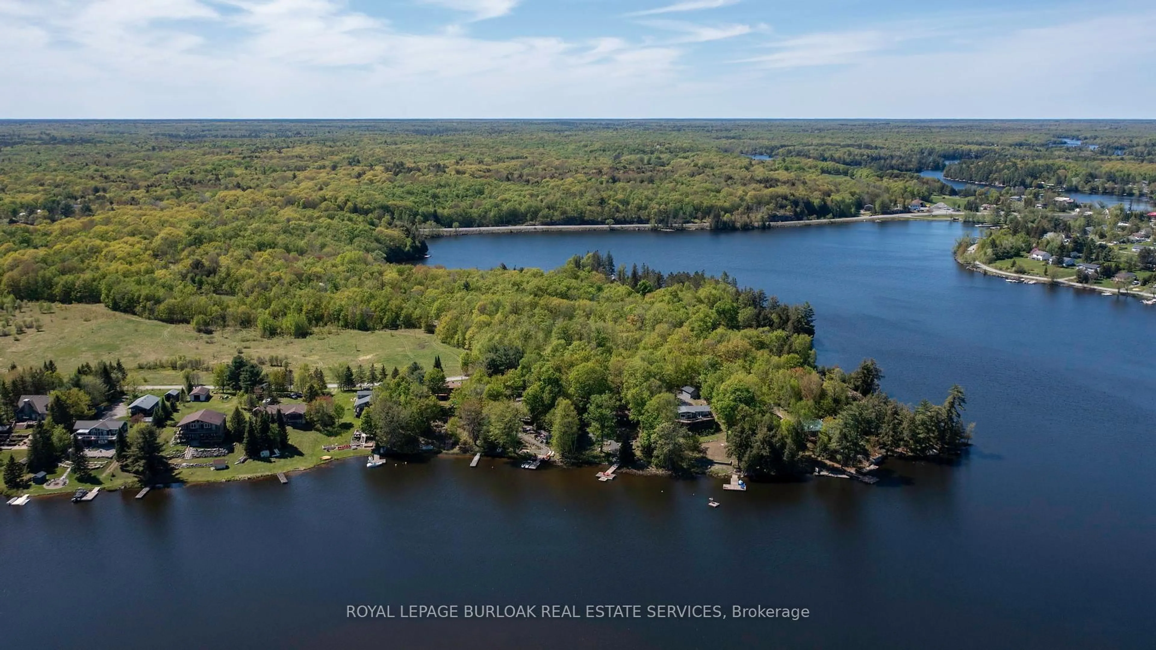A pic from outside/outdoor area/front of a property/back of a property/a pic from drone, water/lake/river/ocean view for 37 Dockside Dr, McKellar Ontario P0G 1C0