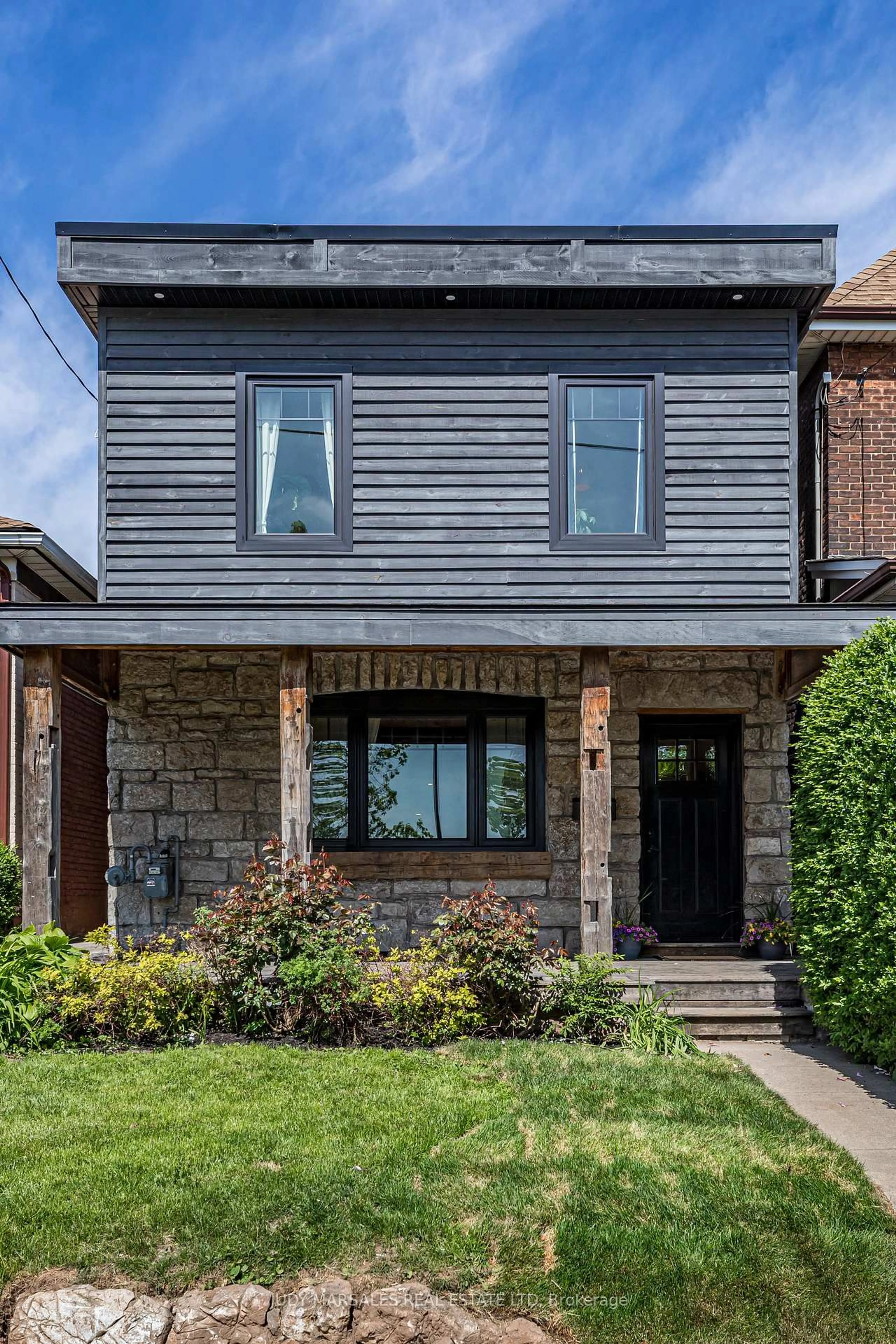 Home with brick exterior material, street for 141 Elgin St, Hamilton Ontario L8L 4Y1