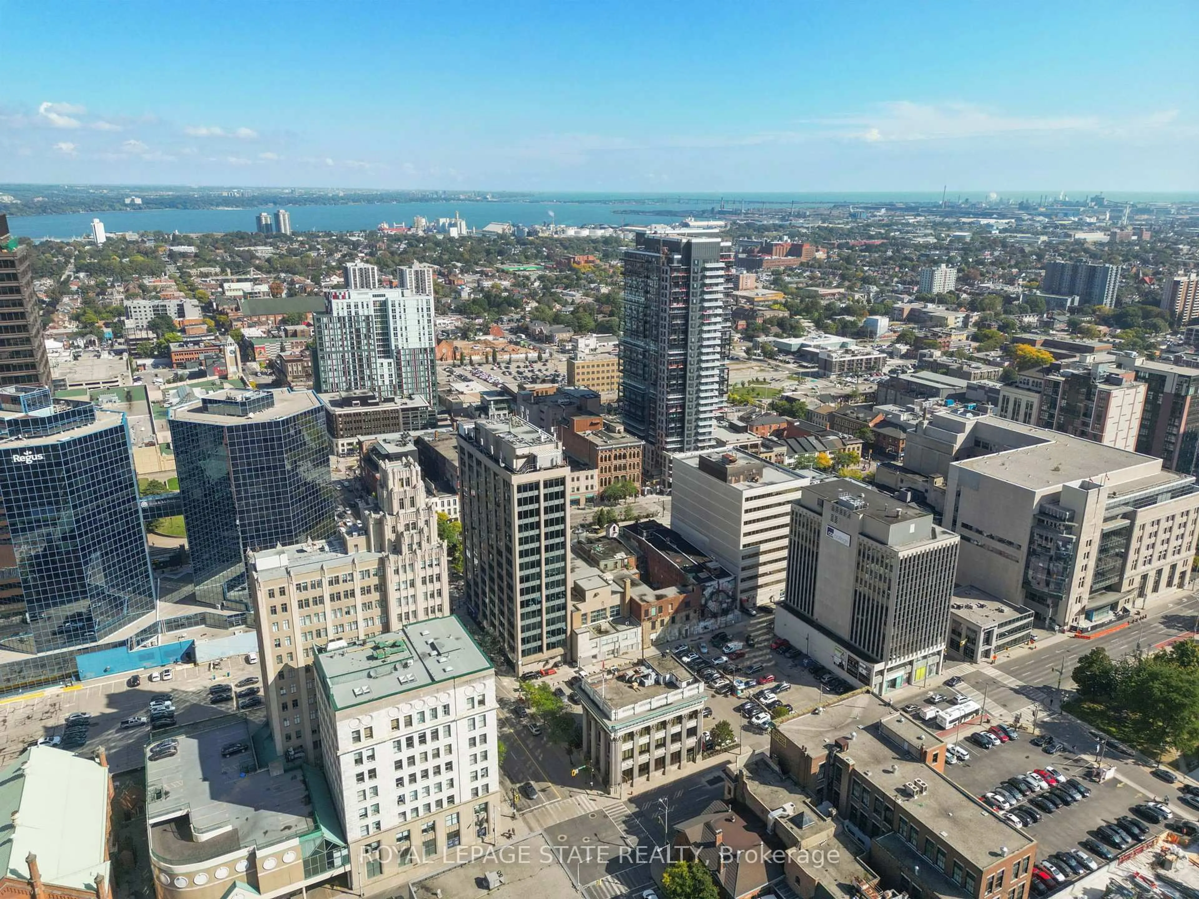 A pic from outside/outdoor area/front of a property/back of a property/a pic from drone, city buildings view from balcony for 36 James St #1205, Hamilton Ontario L8P 4W4