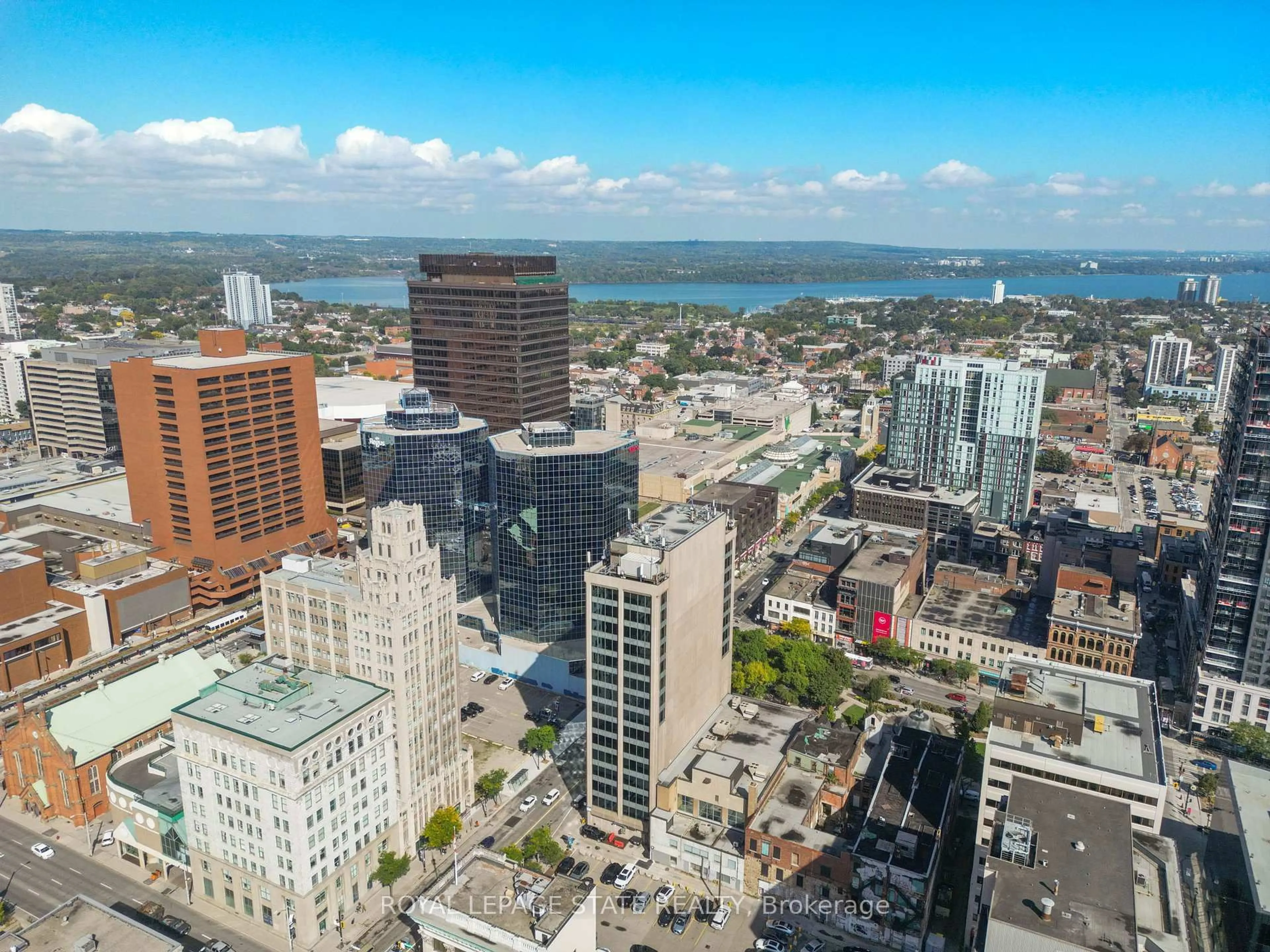 A pic from outside/outdoor area/front of a property/back of a property/a pic from drone, city buildings view from balcony for 36 James St #1205, Hamilton Ontario L8P 4W4