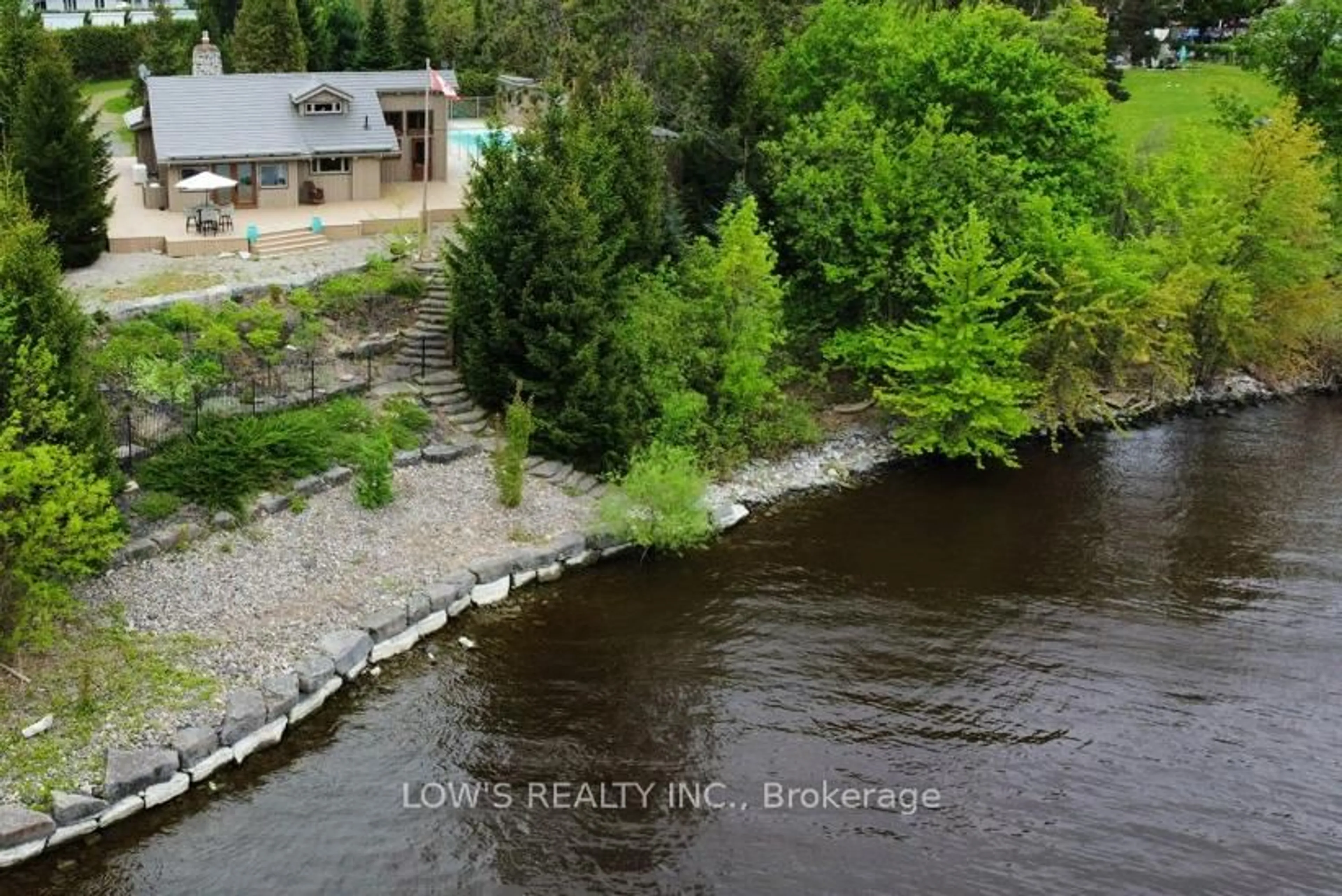A pic from outside/outdoor area/front of a property/back of a property/a pic from drone, water/lake/river/ocean view for 1 Peter St, Champlain Ontario K0B 1K0