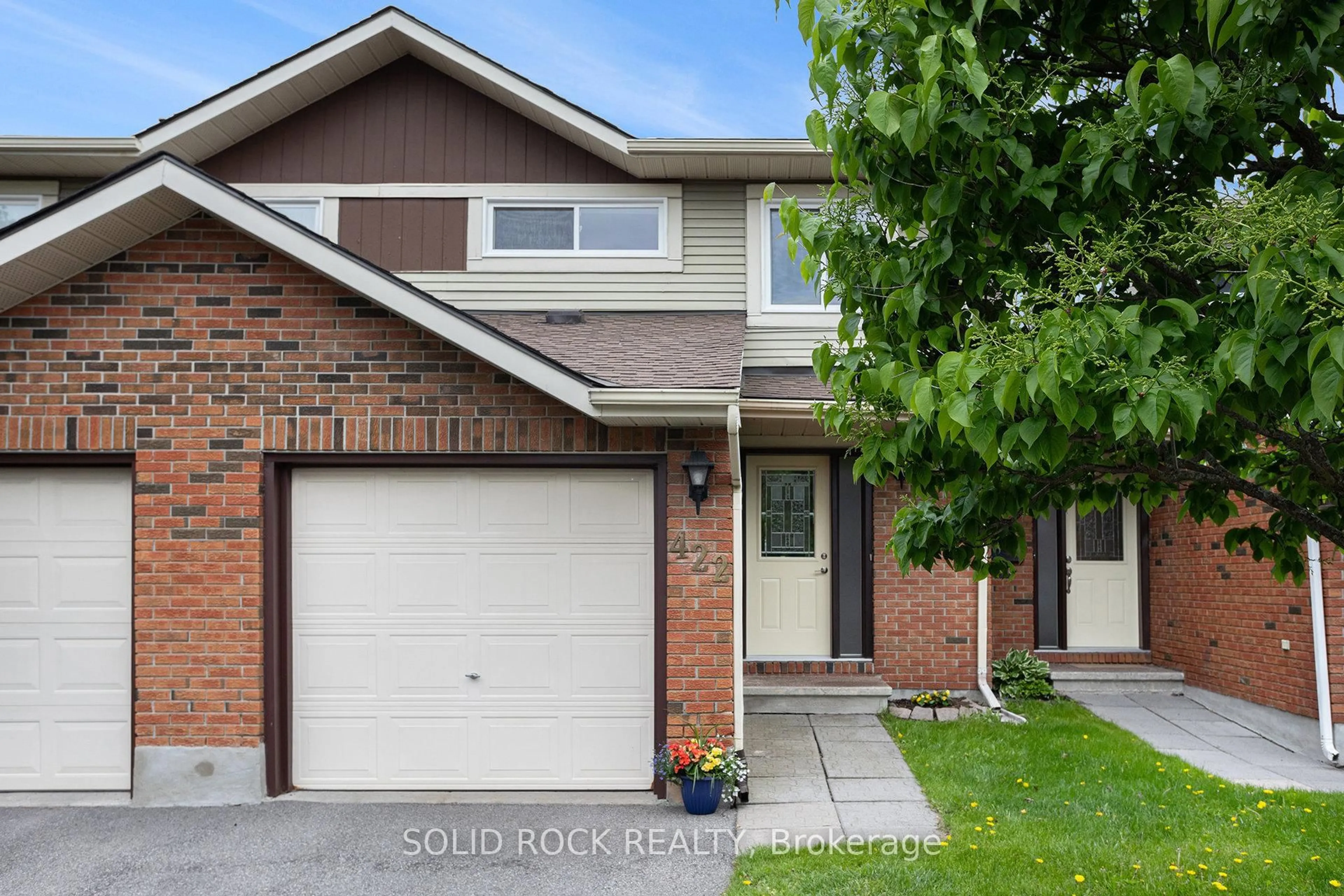 Home with brick exterior material, street for 422 Sandhamn Private, Ottawa Ontario K1T 2Z1