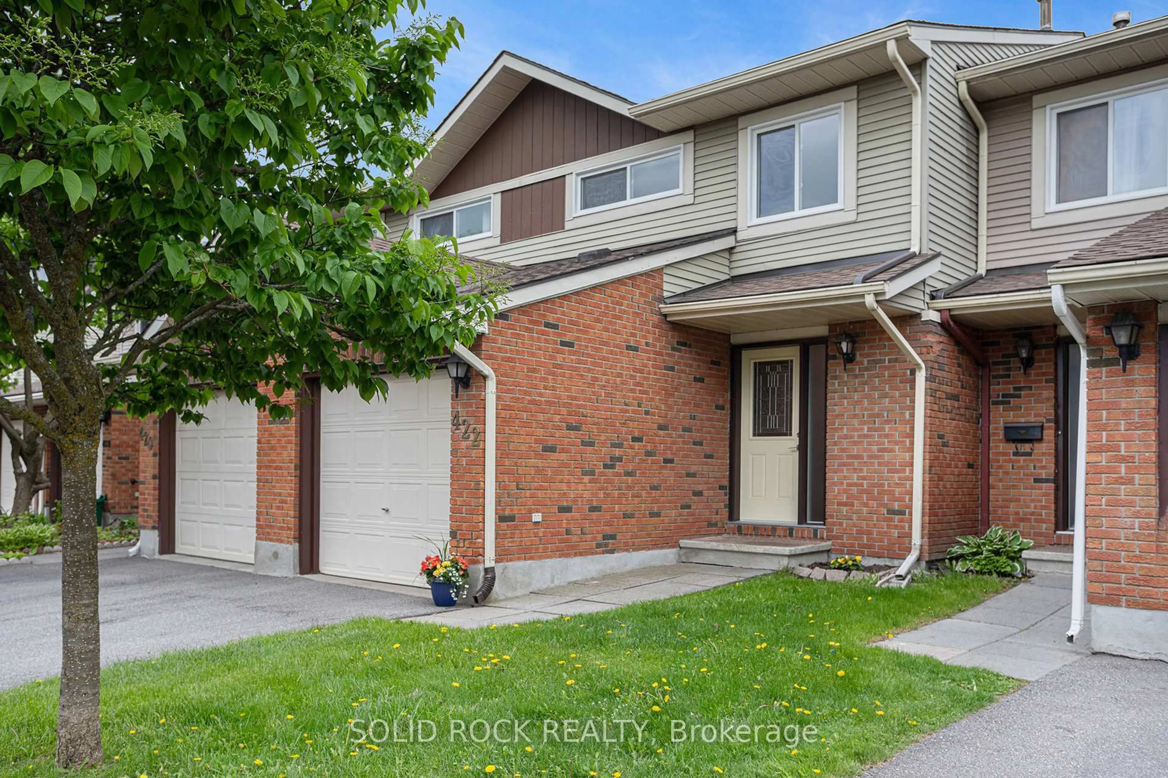 Home with brick exterior material, street for 422 Sandhamn Private, Ottawa Ontario K1T 2Z1