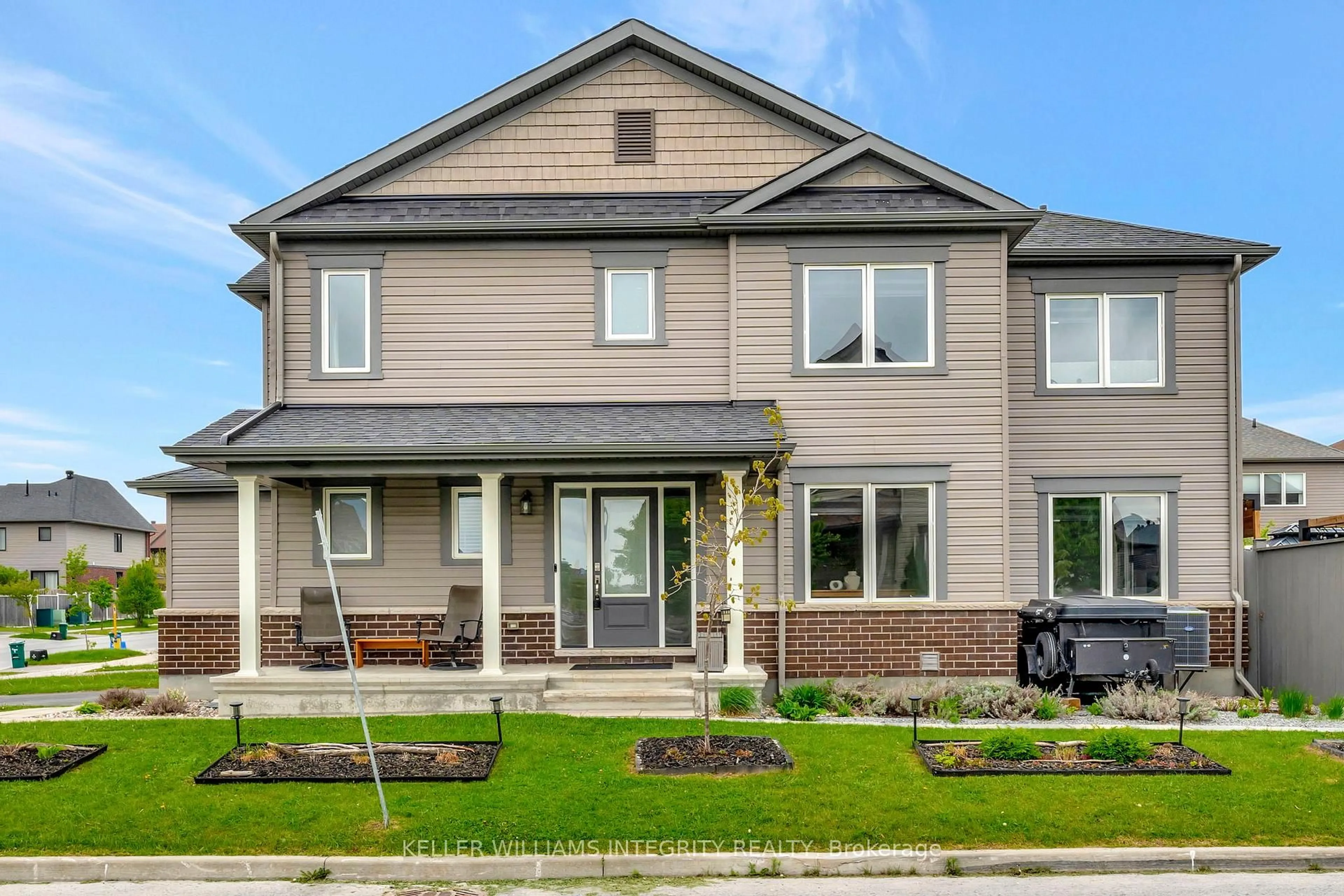 Home with brick exterior material, street for 553 Paine Ave, Ottawa Ontario K2T 0K7