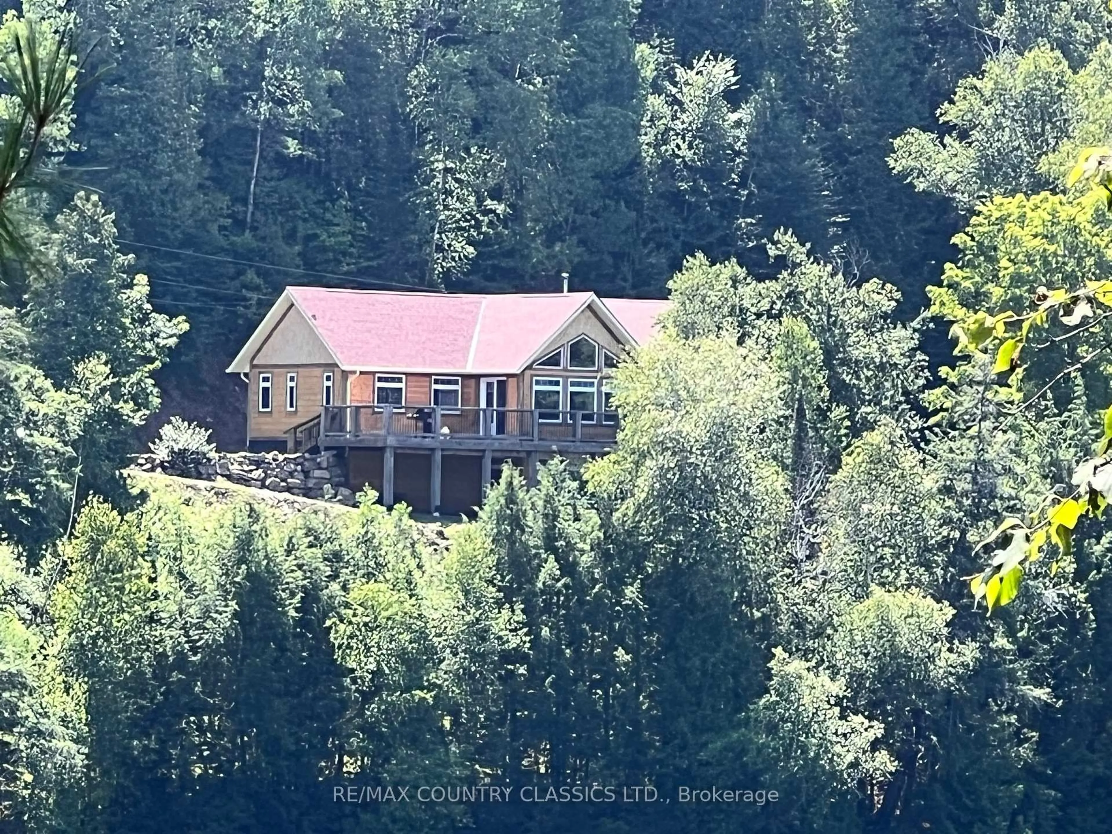 A pic from outside/outdoor area/front of a property/back of a property/a pic from drone, forest/trees view for 518 Duncan Lane, Bancroft Ontario K0L 1C0